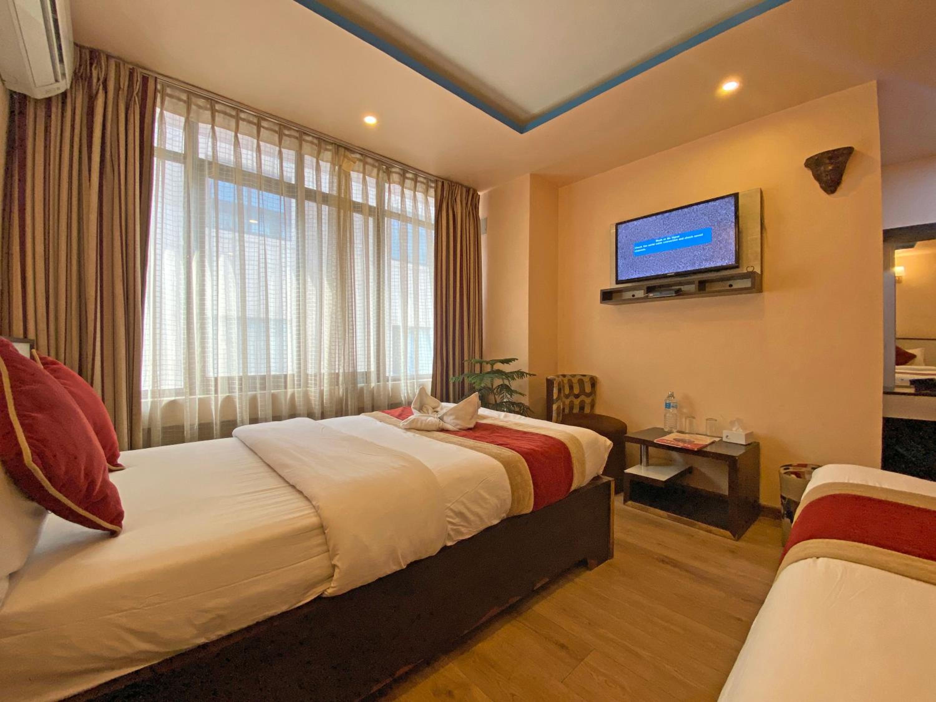 Deluxe Quadruple Room - Photo 6