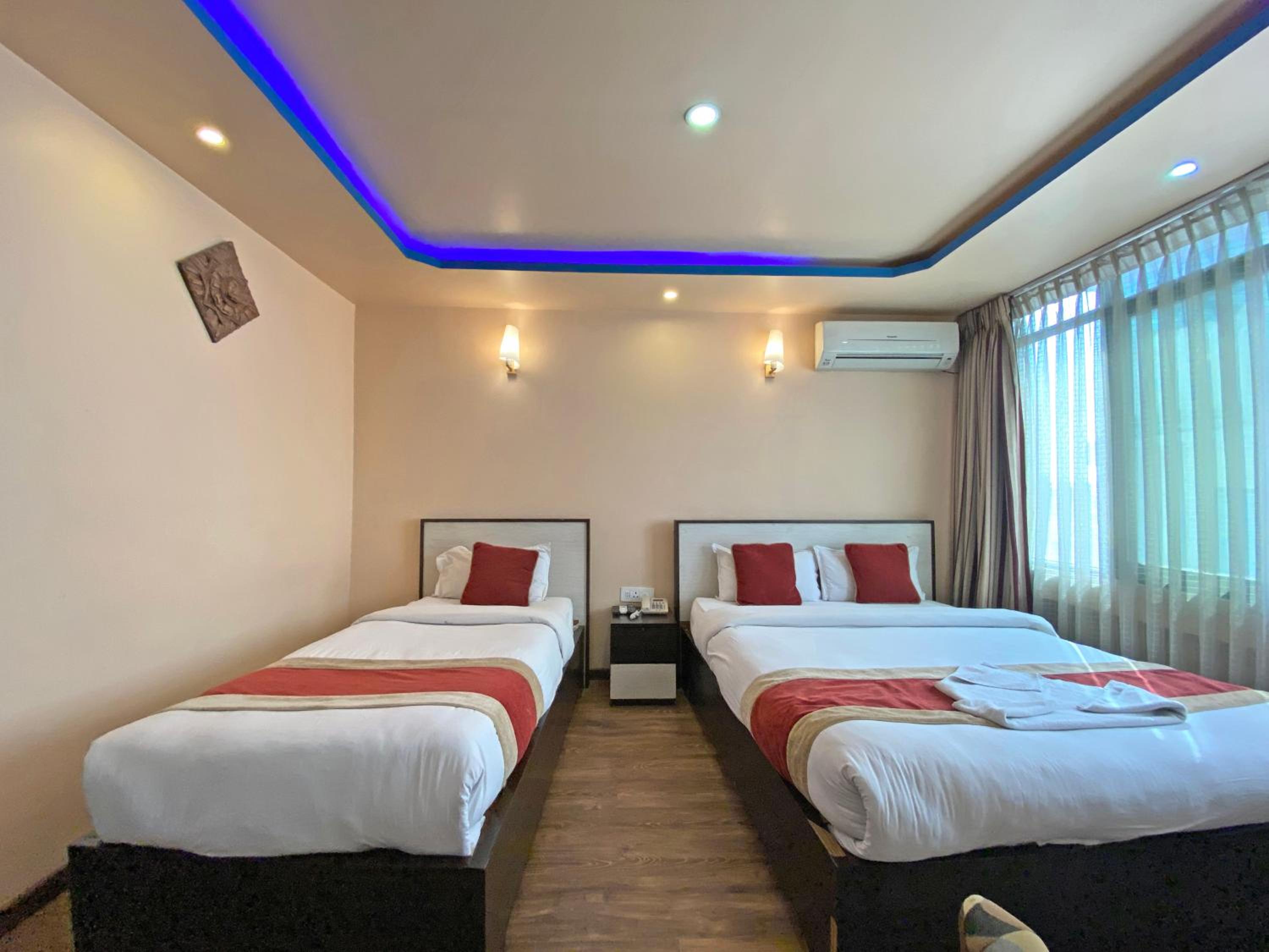 Deluxe Triple Room - Photo 23