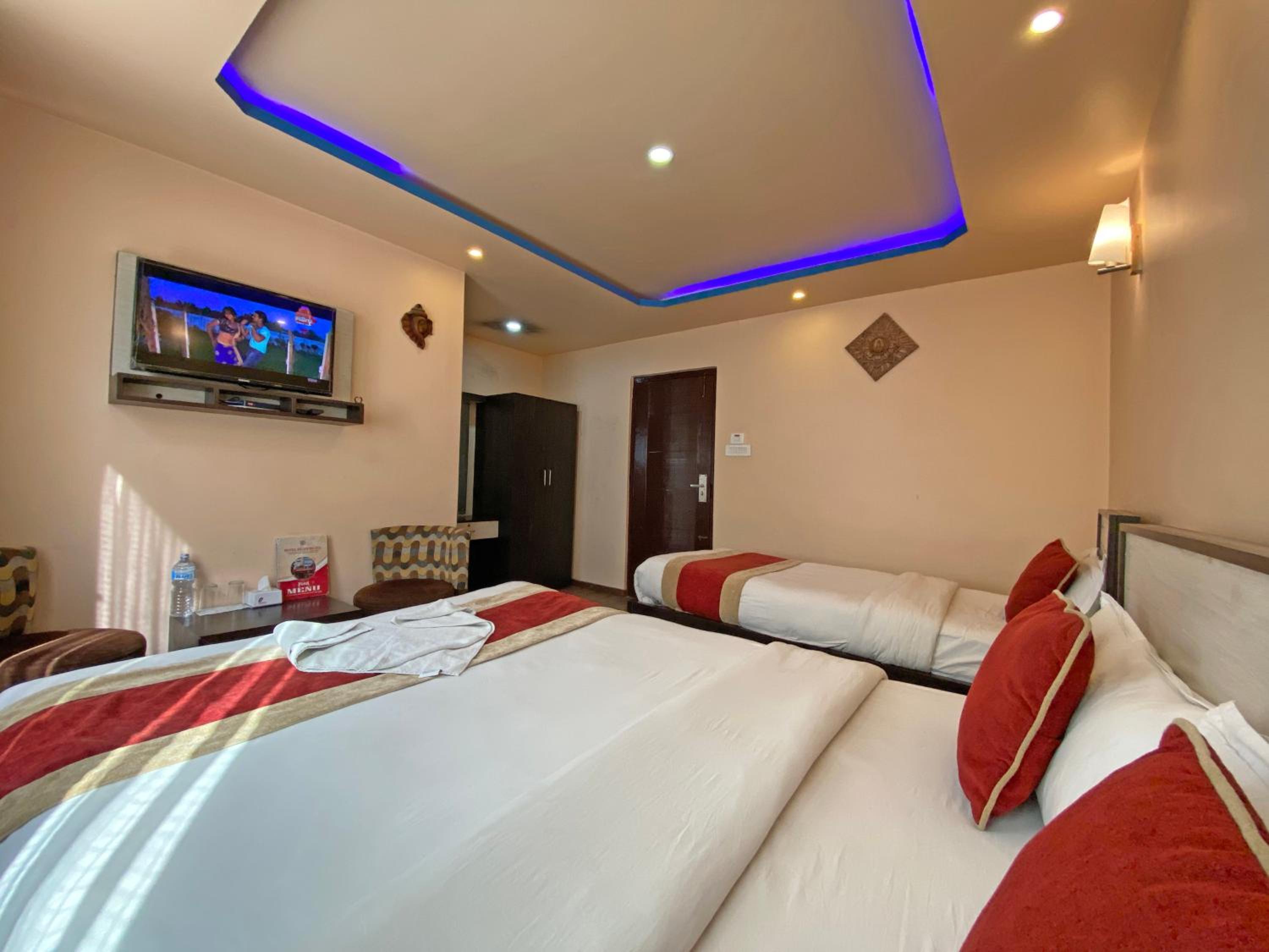 Deluxe Triple Room - Photo 22