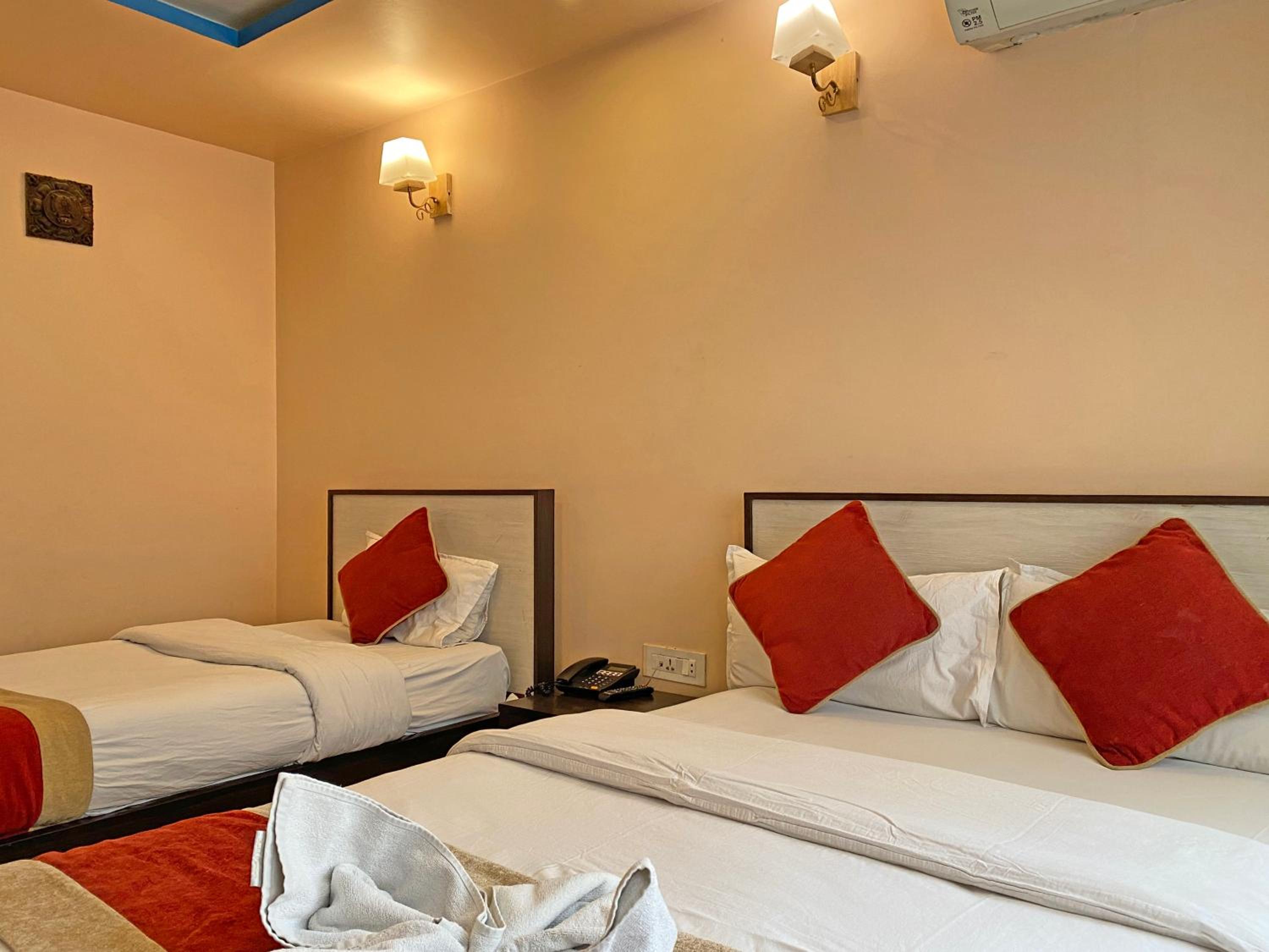 Deluxe Triple Room - Photo 21