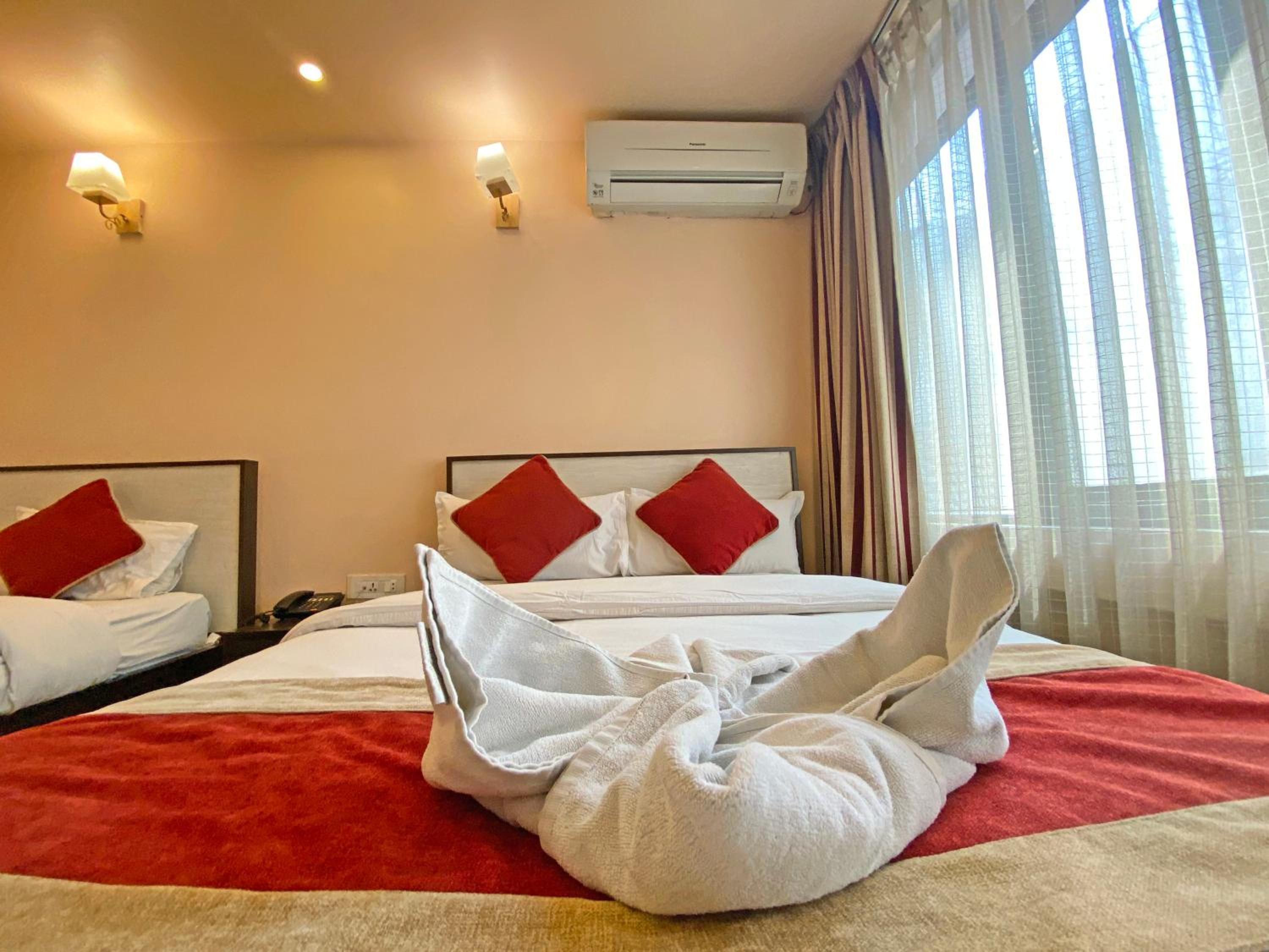 Deluxe Triple Room - Photo 26