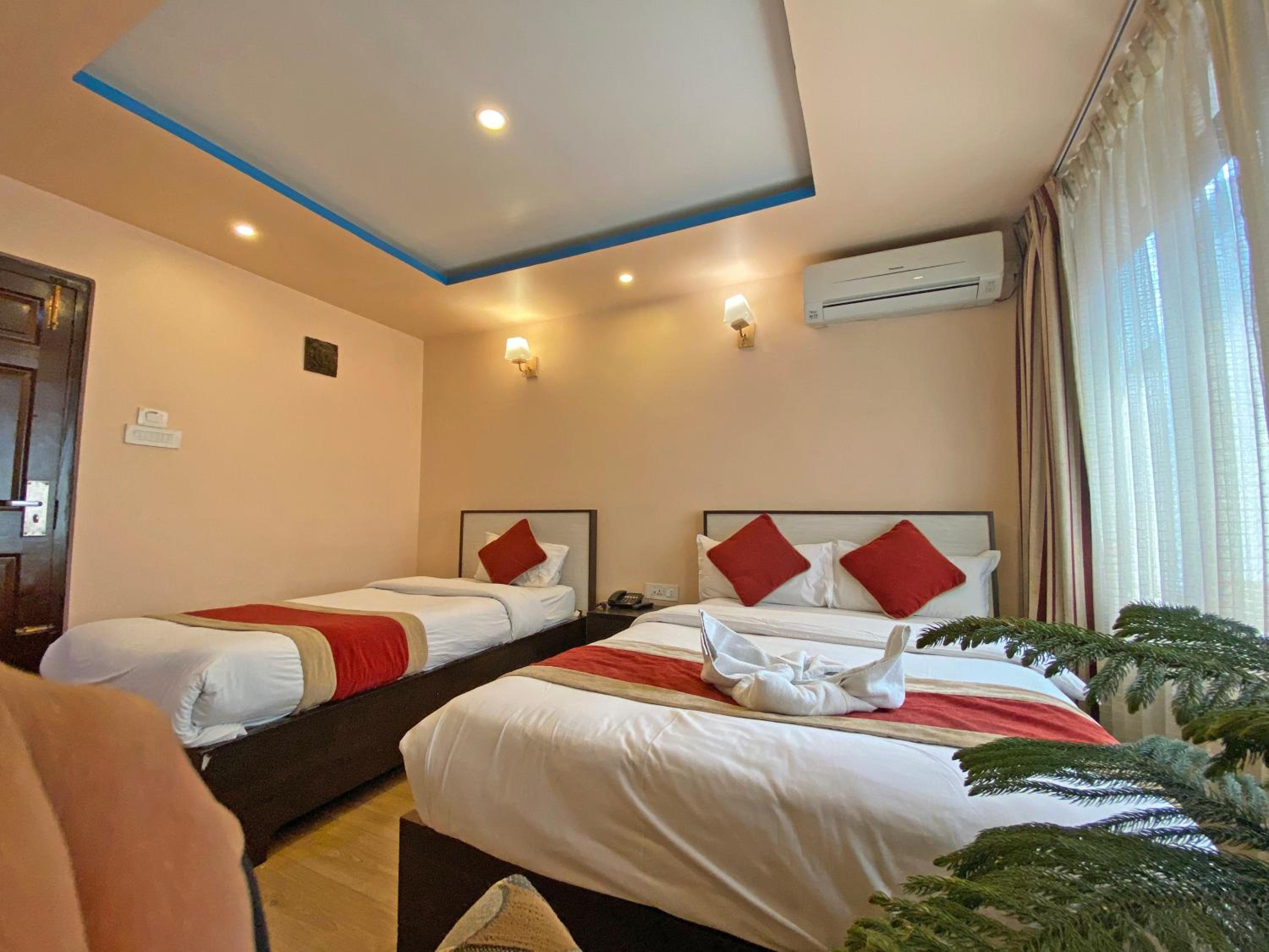 Deluxe Triple Room - Photo 20