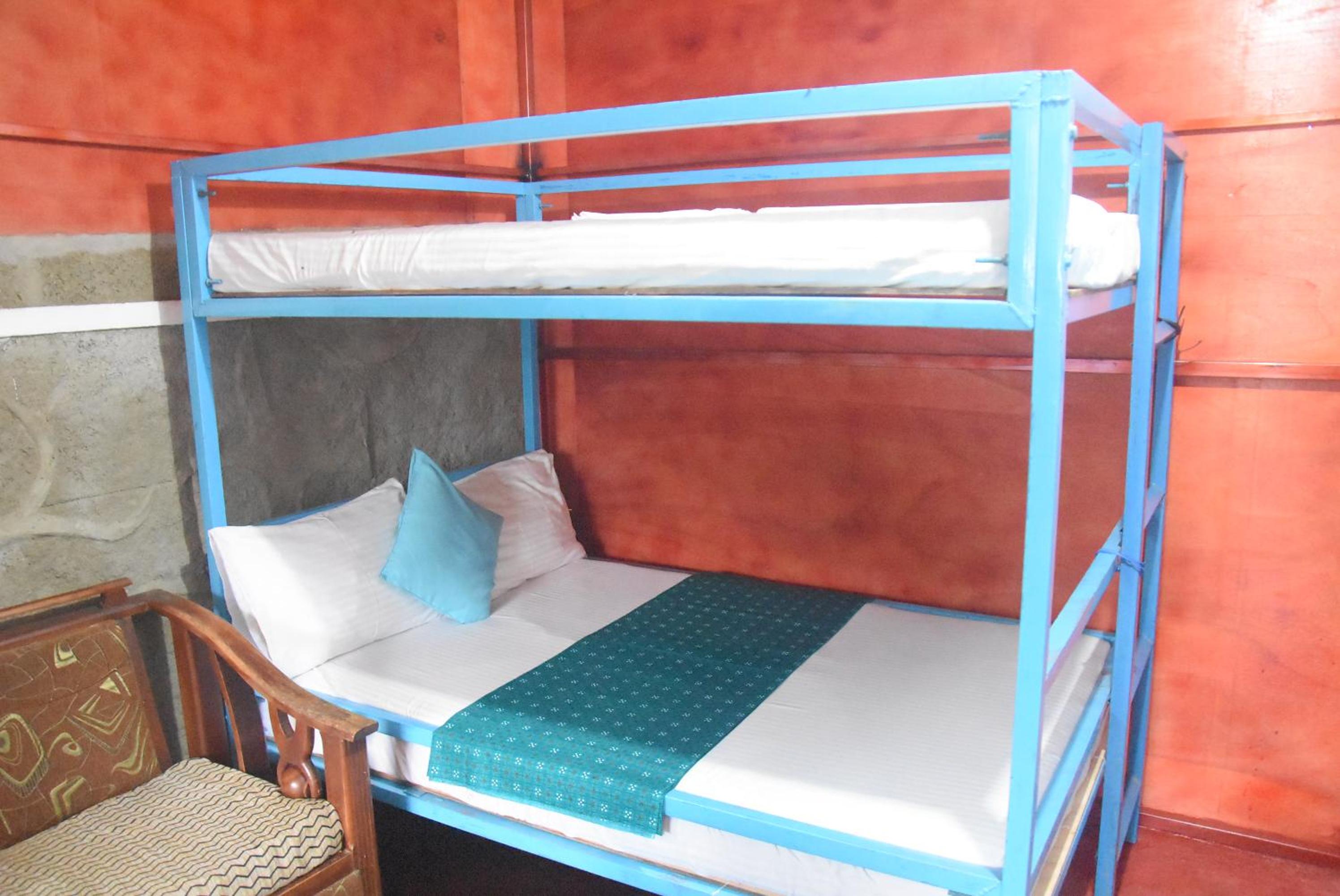 Single Bed in Dormitory Room
