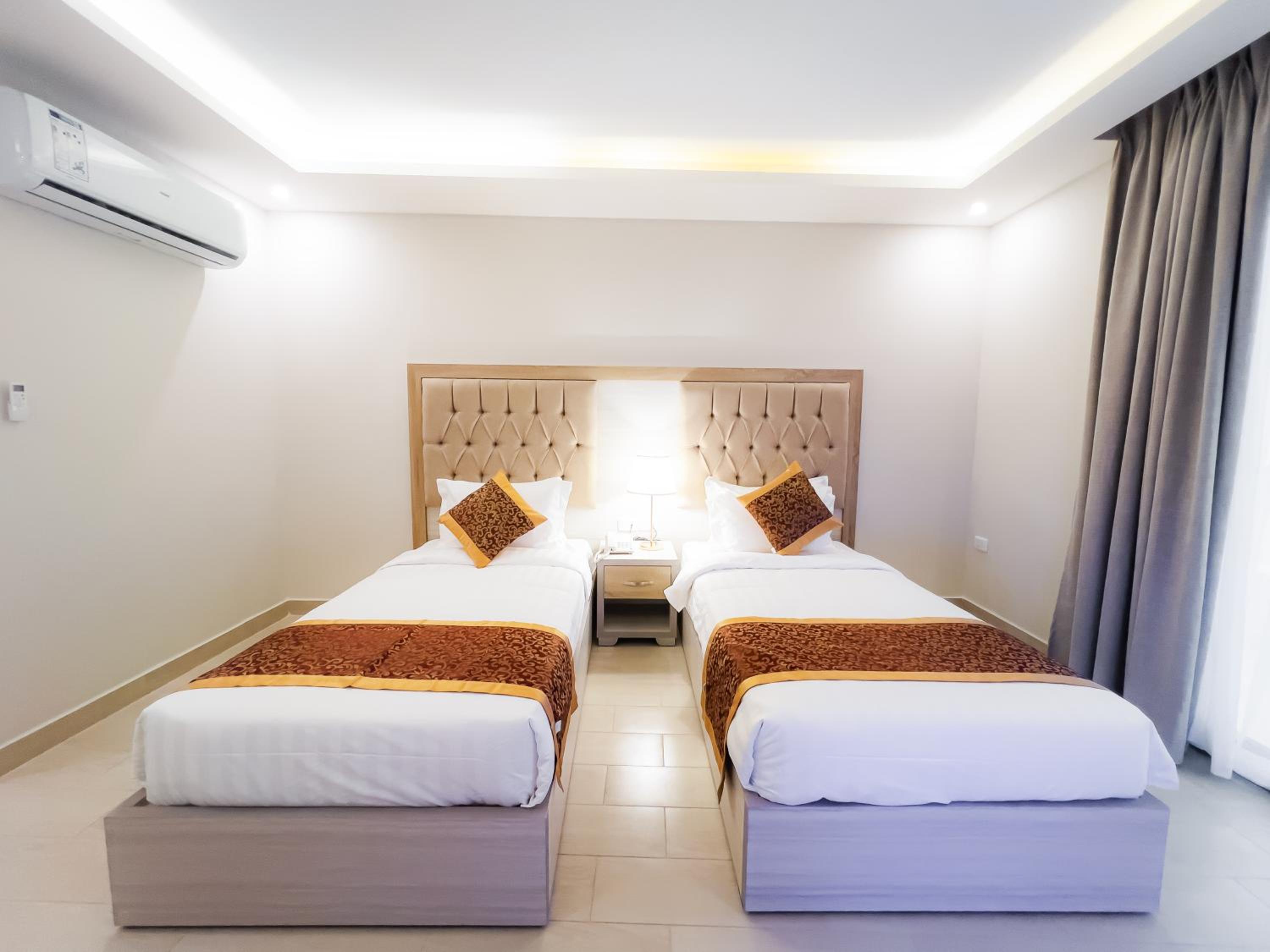 Deluxe Twin Room - Photo 12