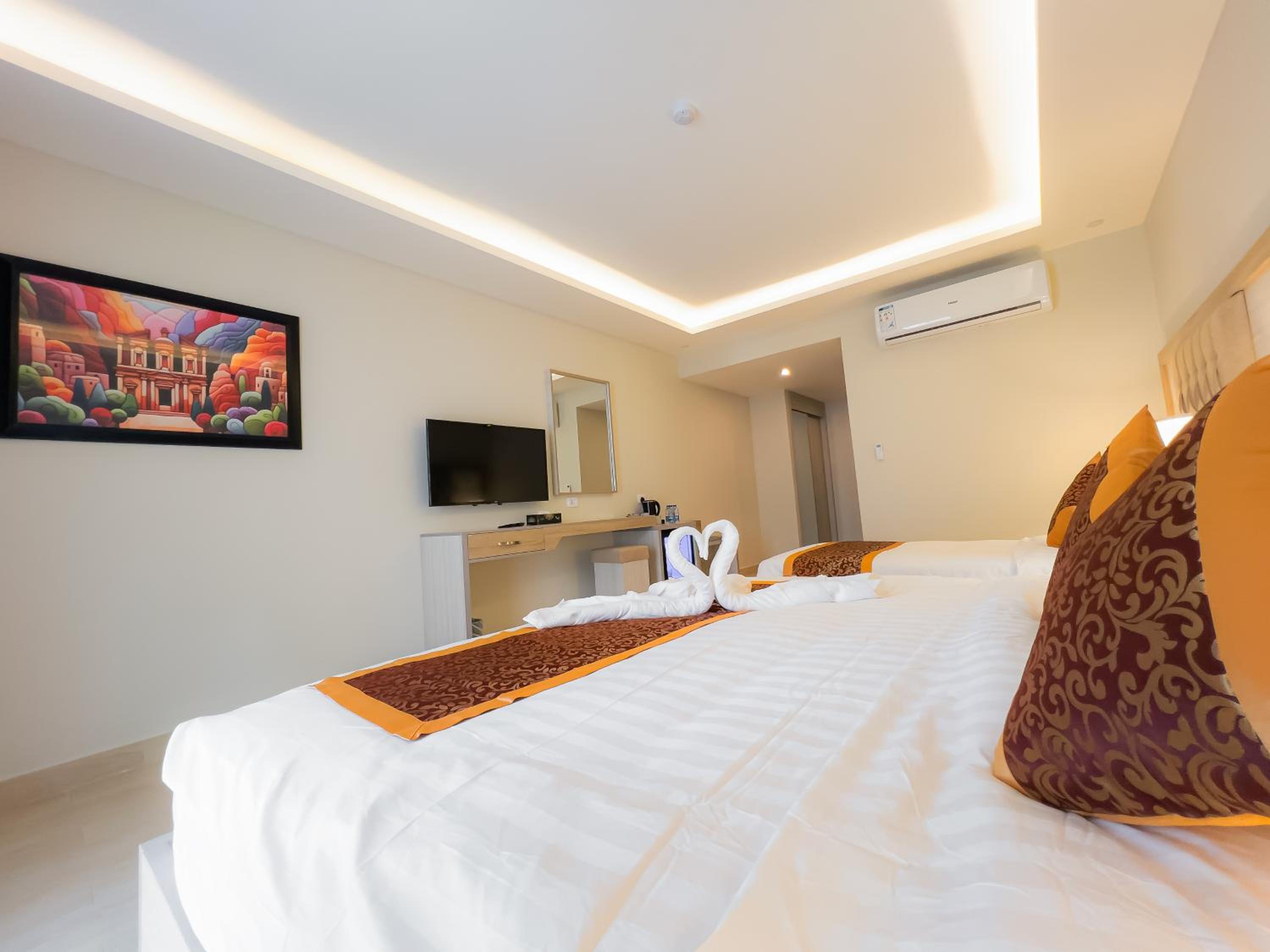 Deluxe Triple Room - Photo 25