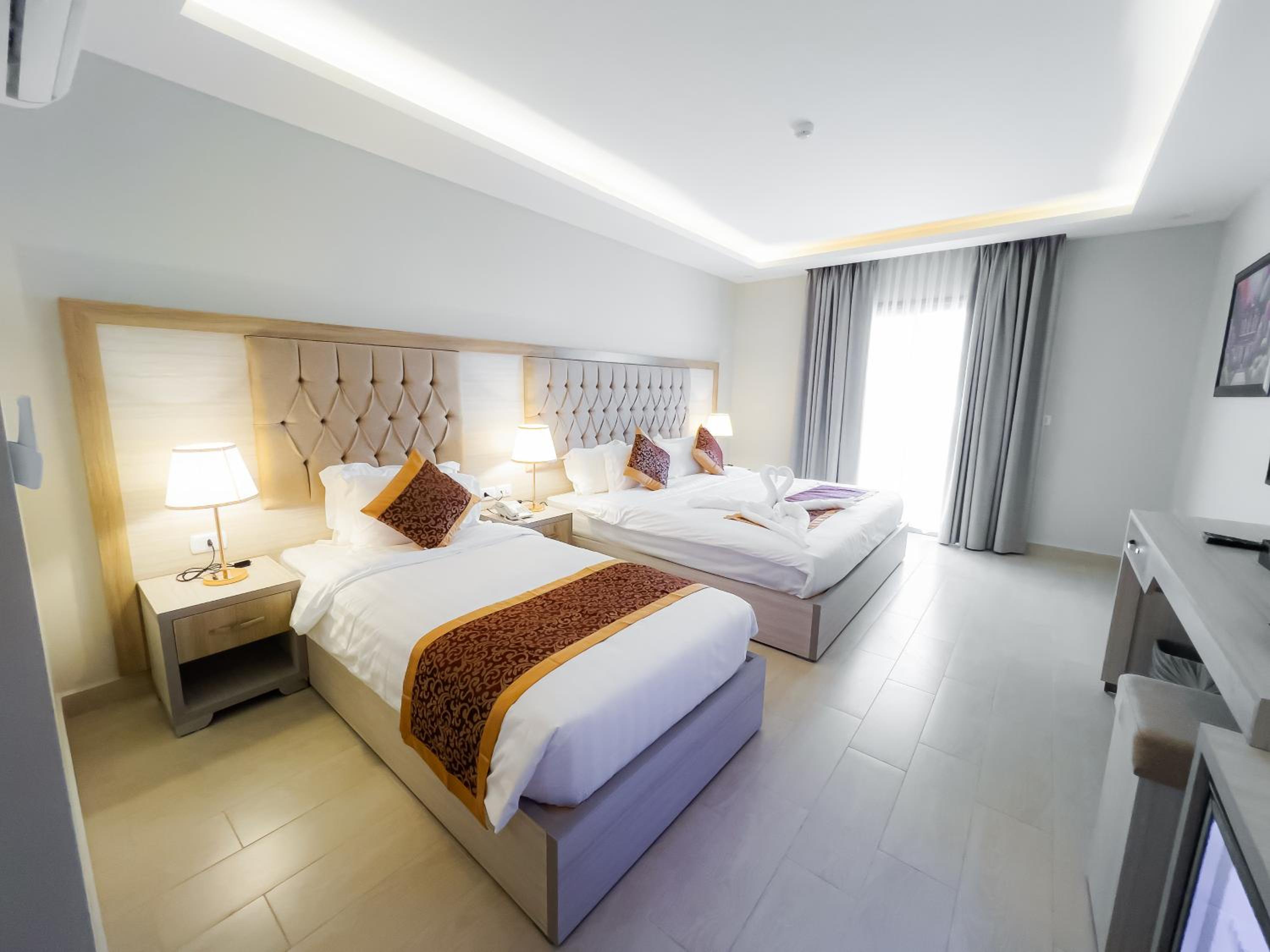 Deluxe Triple Room - Photo 7