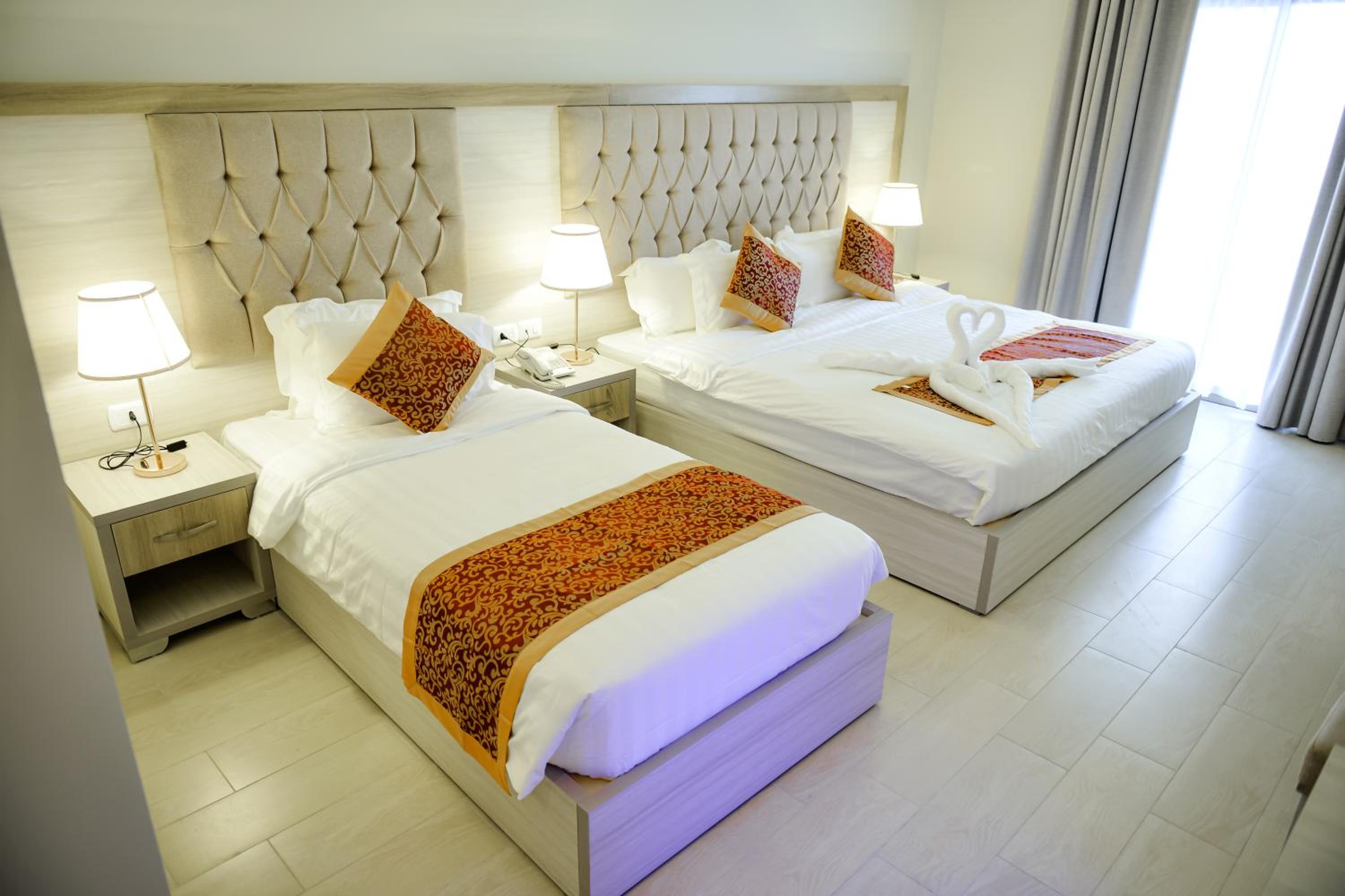 Deluxe Triple Room - Photo 16