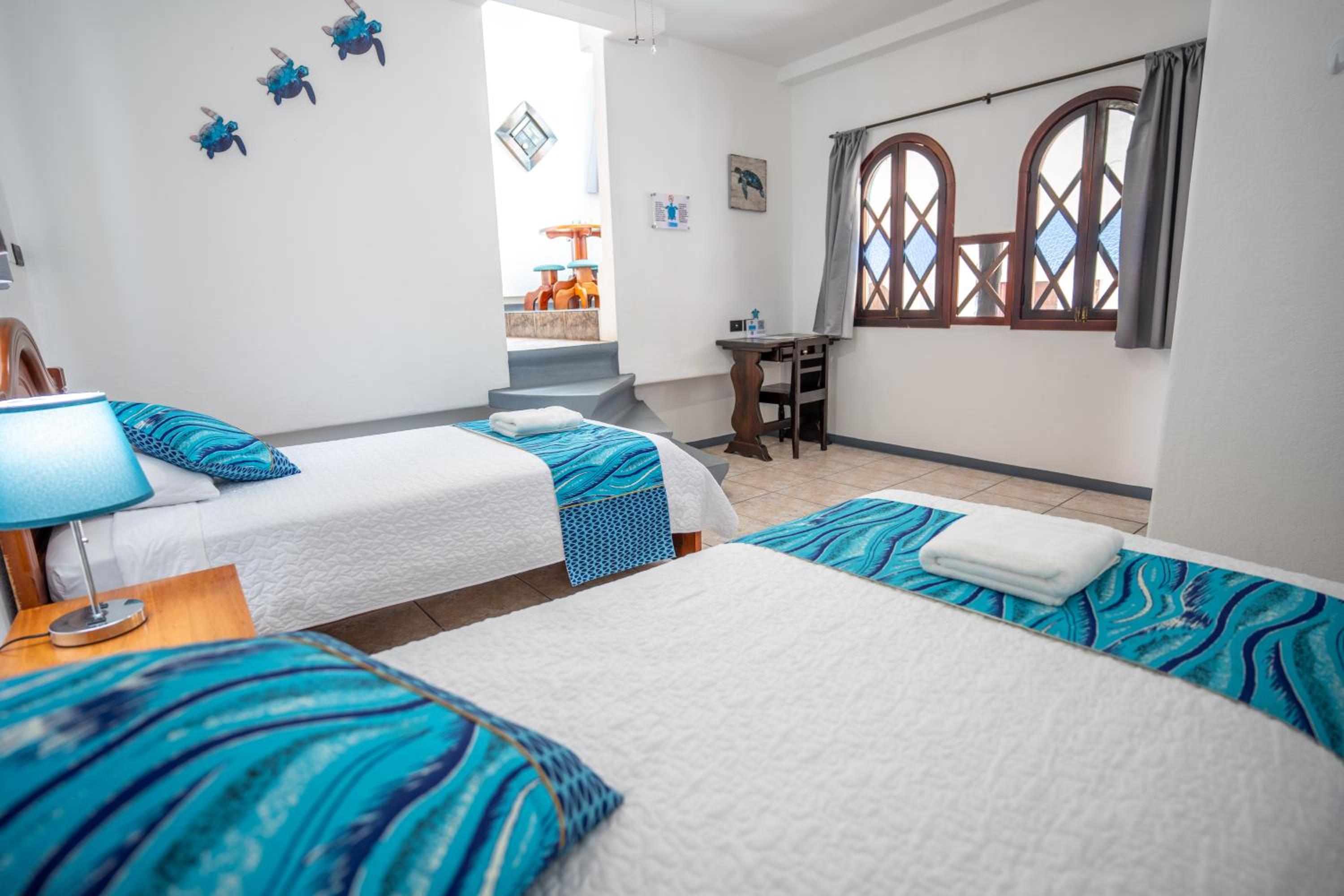 Piqueros / Family Room with Balcony