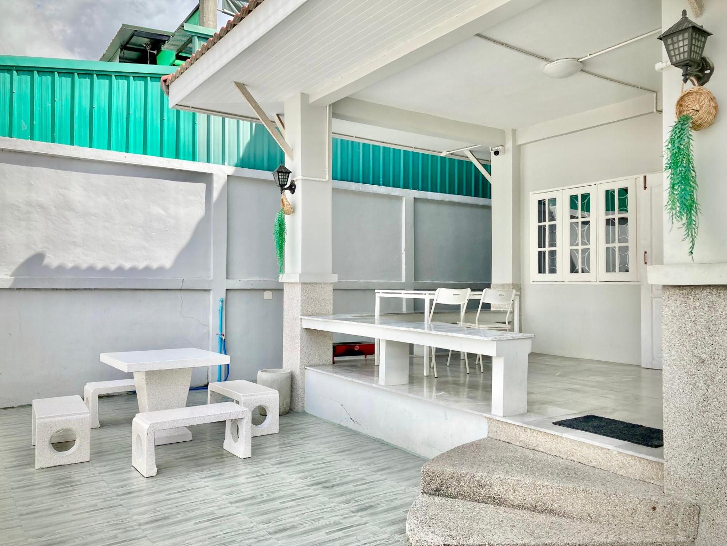 Four-Bedroom House - Photo 42