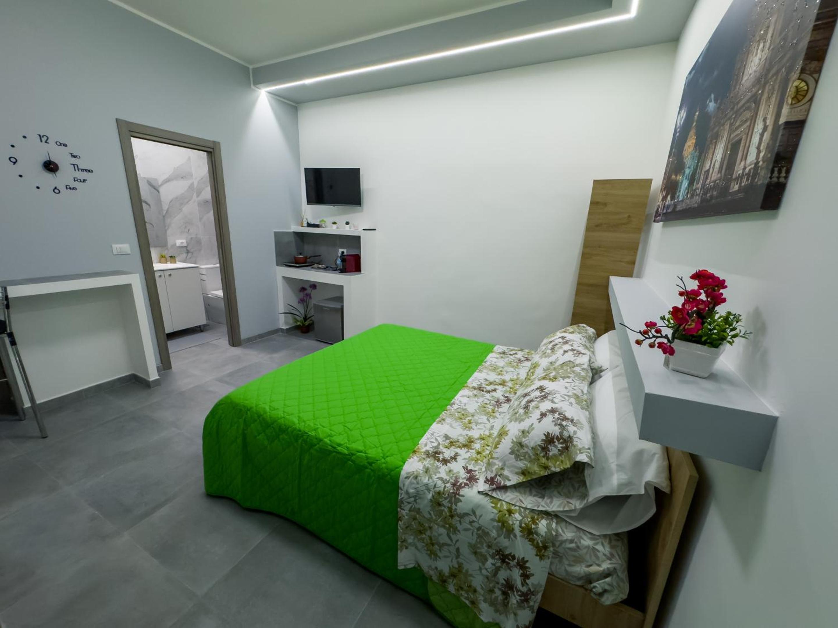 Quadruple Room with Private Bathroom