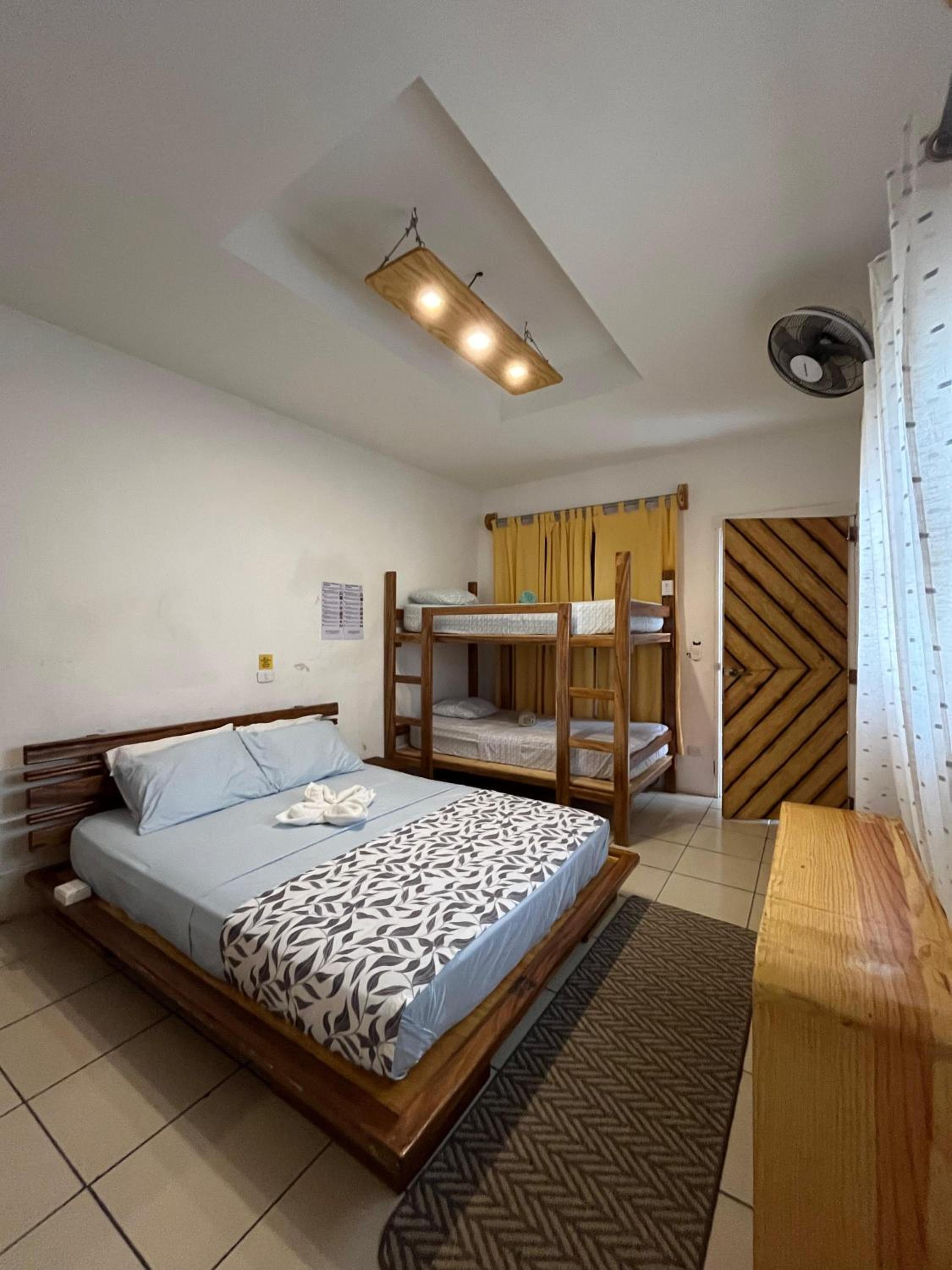 Economy Quadruple Room With Shared Bathroom photo 1