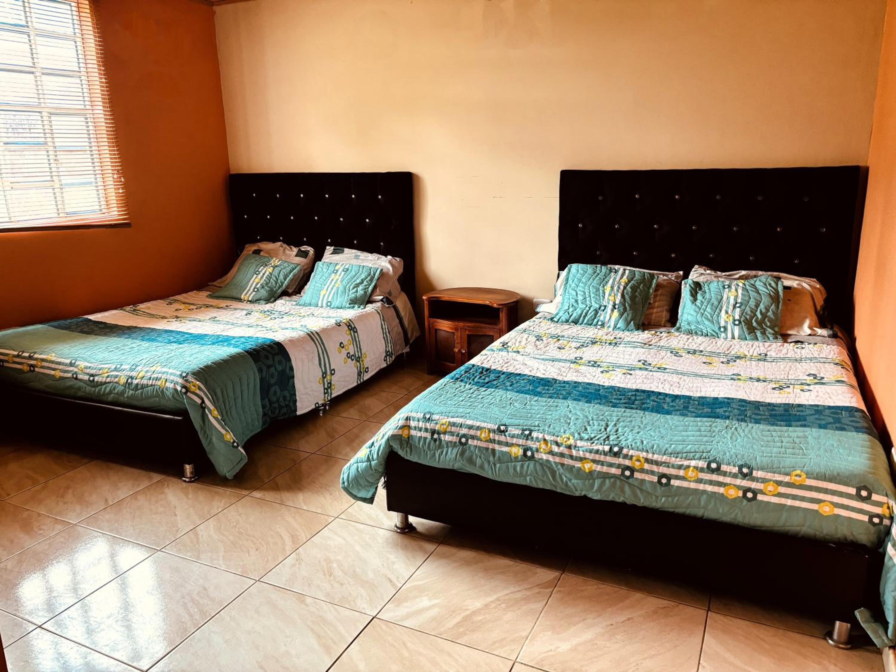 Quadruple Room with Private Bathroom photo 3