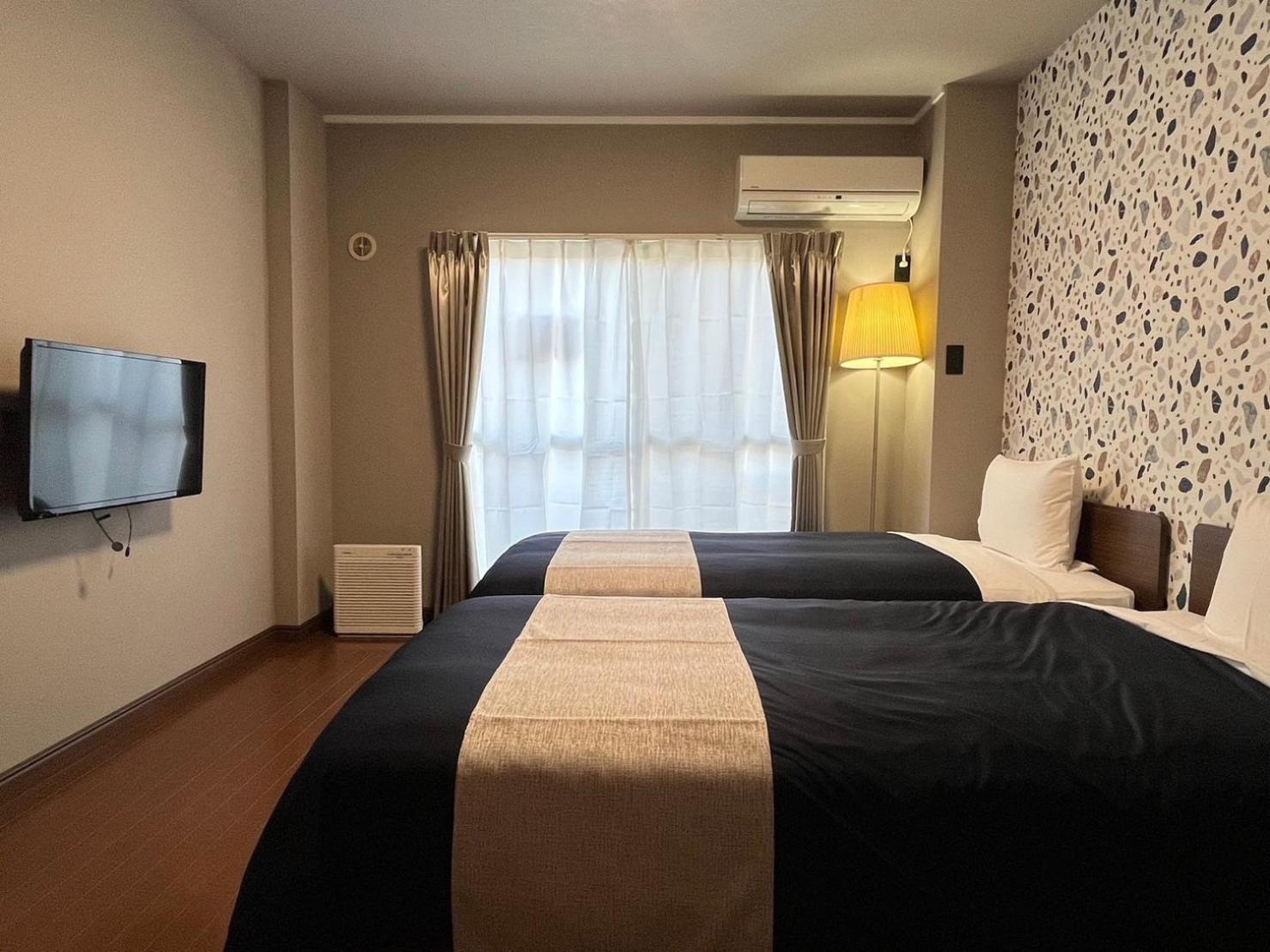 Standard Twin Room - Photo 1