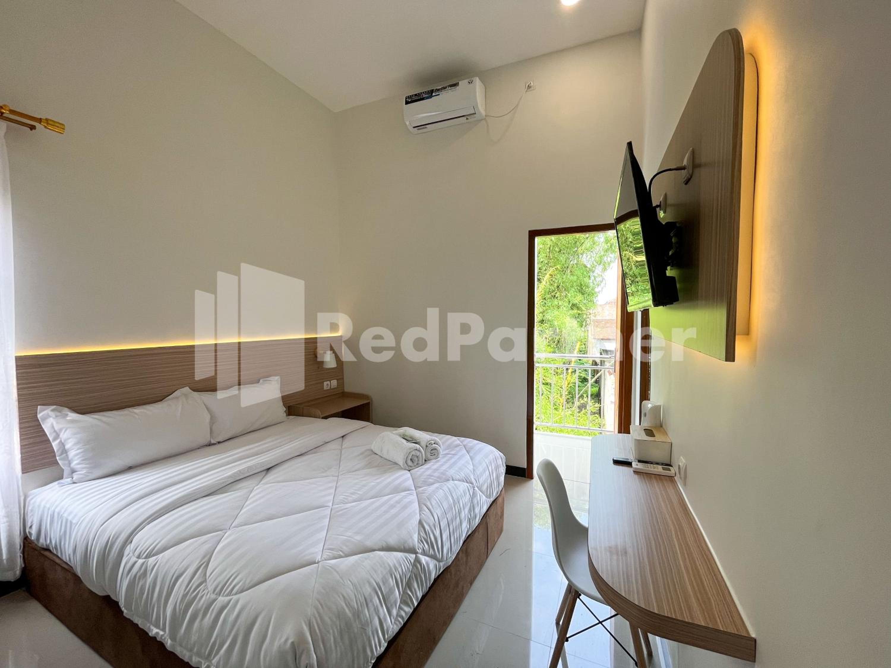Deluxe Room - Photo 5