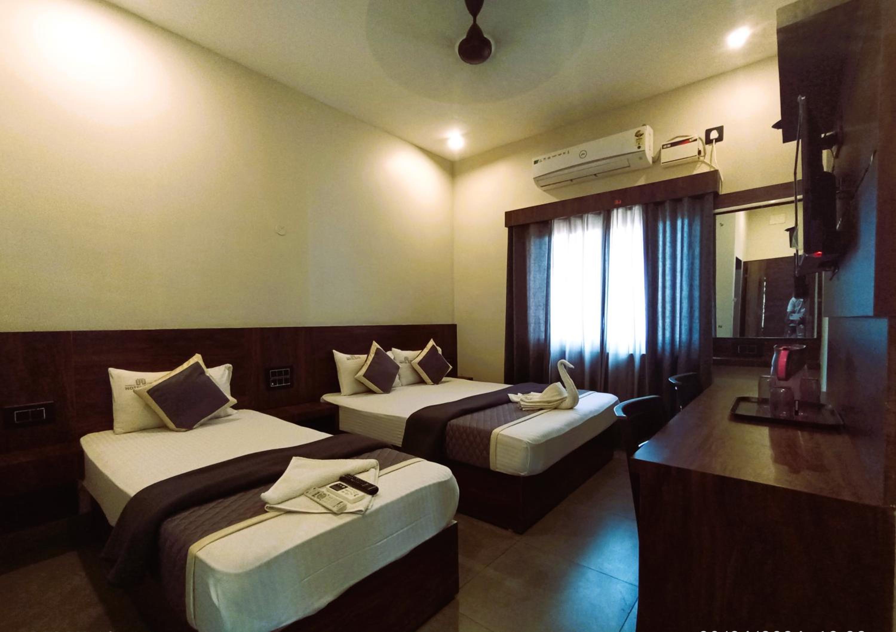 Deluxe Triple Room - Photo 7