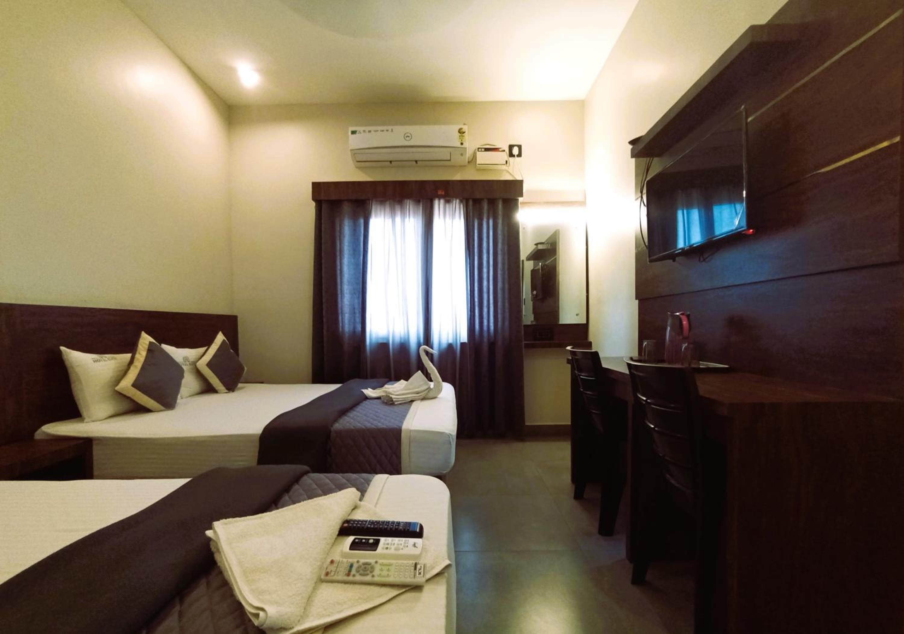 Deluxe Triple Room - Photo 8