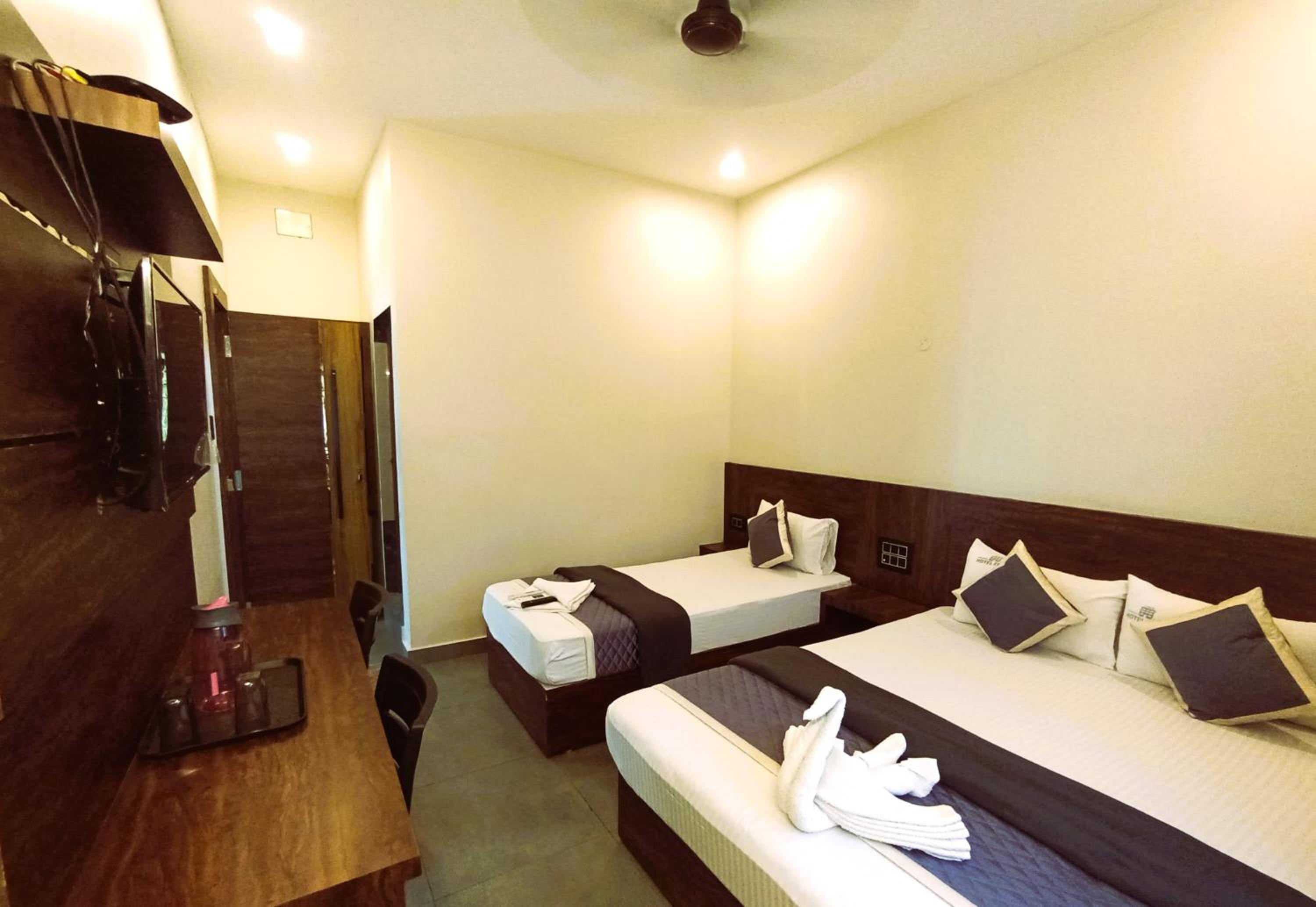 Deluxe Triple Room - Photo 9
