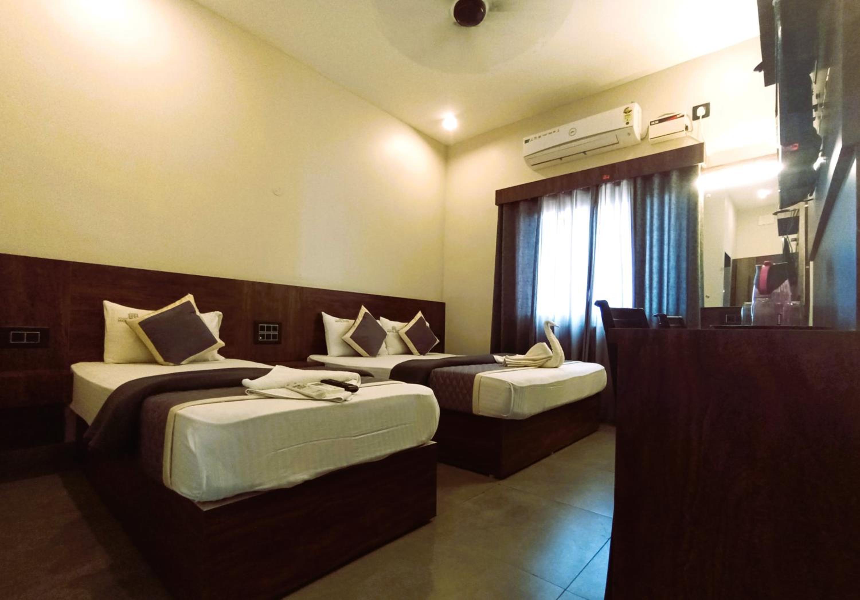 Deluxe Triple Room - Photo 10