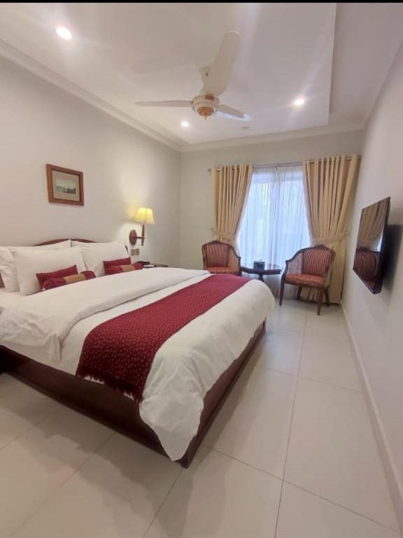 Deluxe King Room - Photo 5