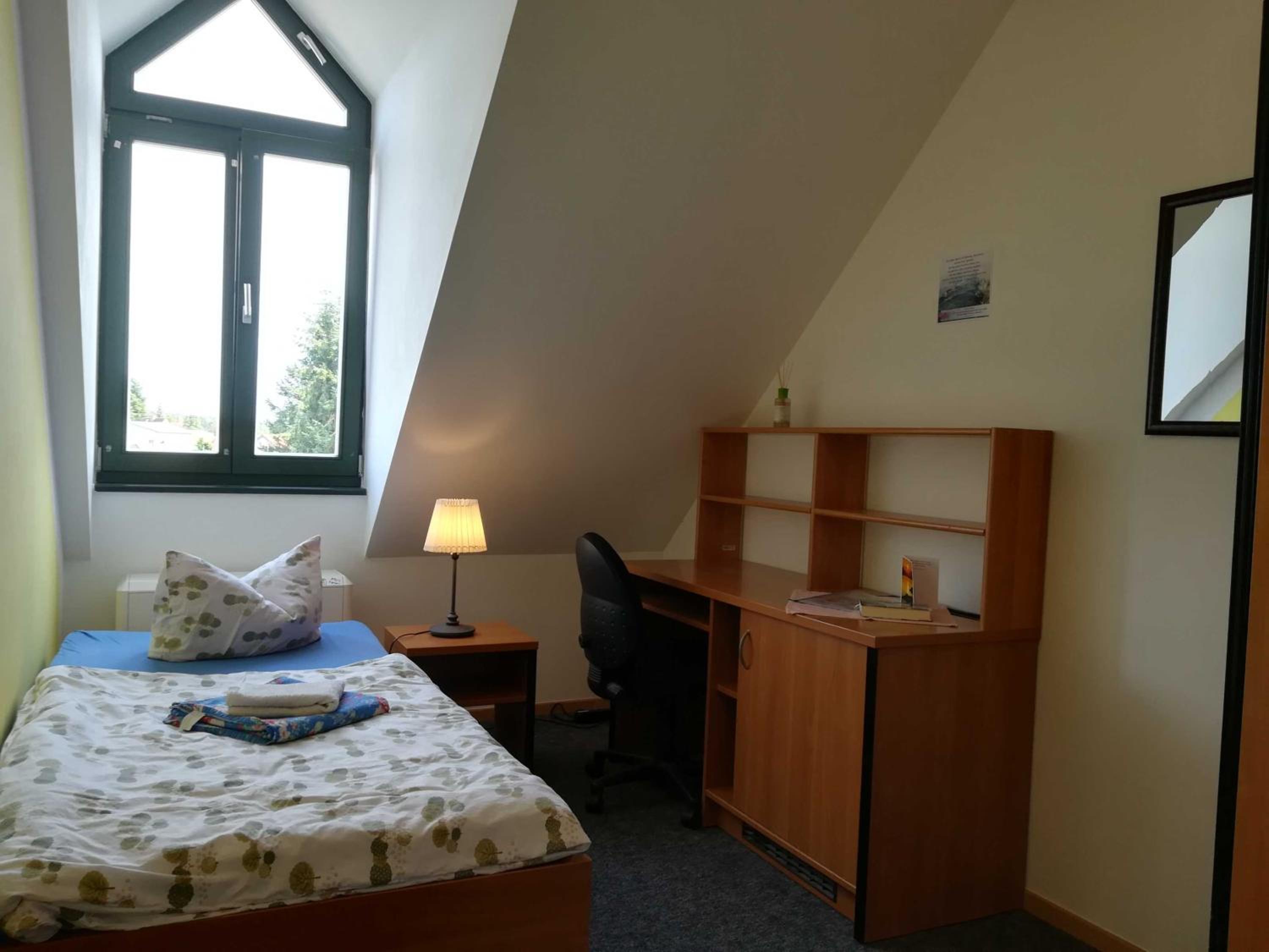 Single Room with Shared Shower and Toilet