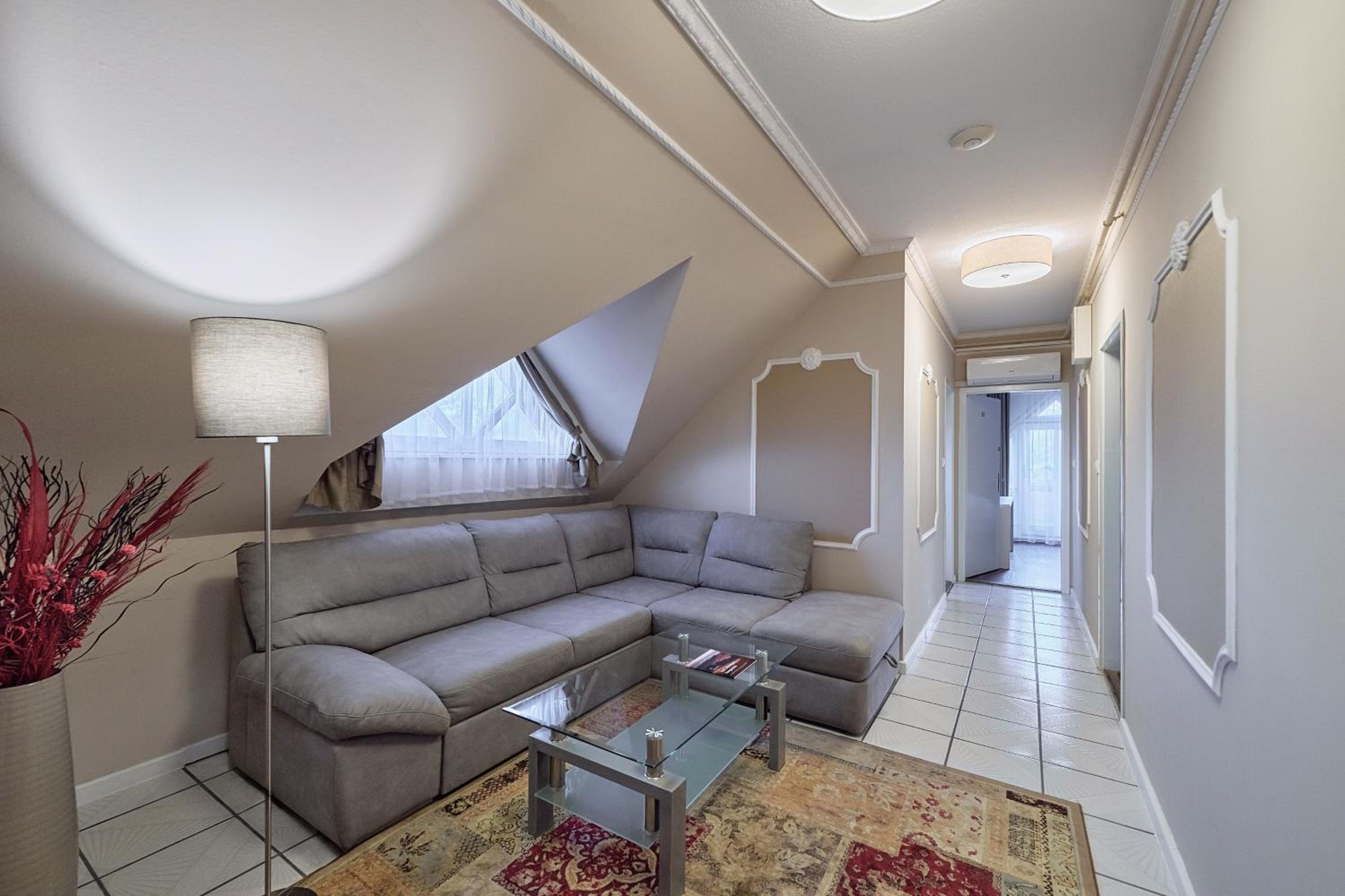 Attic Two-Bedroom Apartment - Photo 1