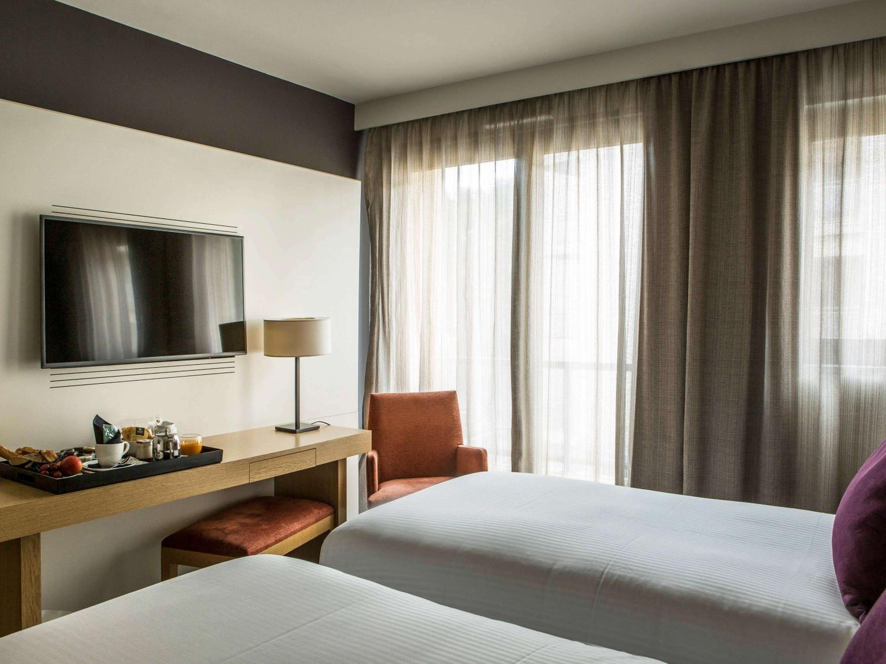 Deluxe Twin Room With Pool View thumbnail 5