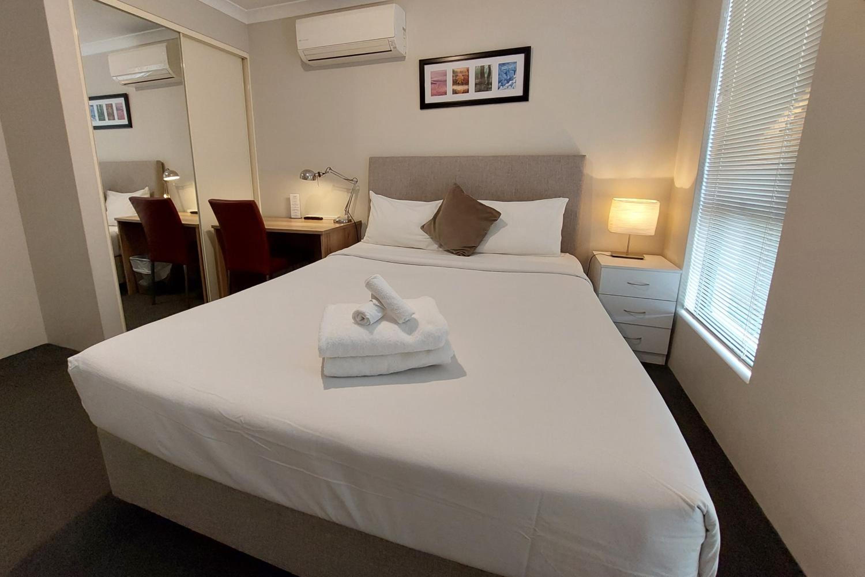 Queen Room with Shared Bathroom