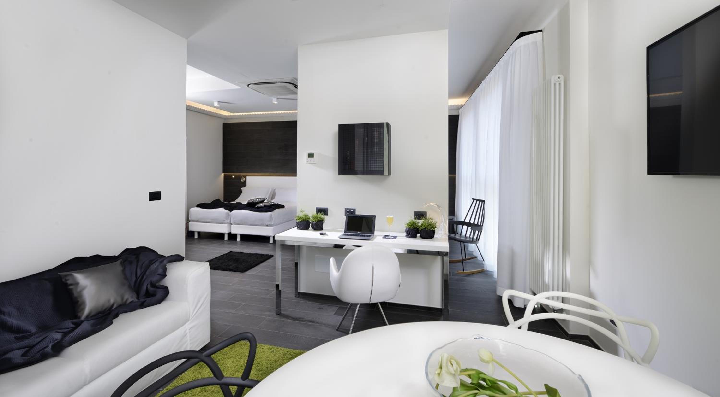 Modern comfort awaits you in this stylish hotel room!