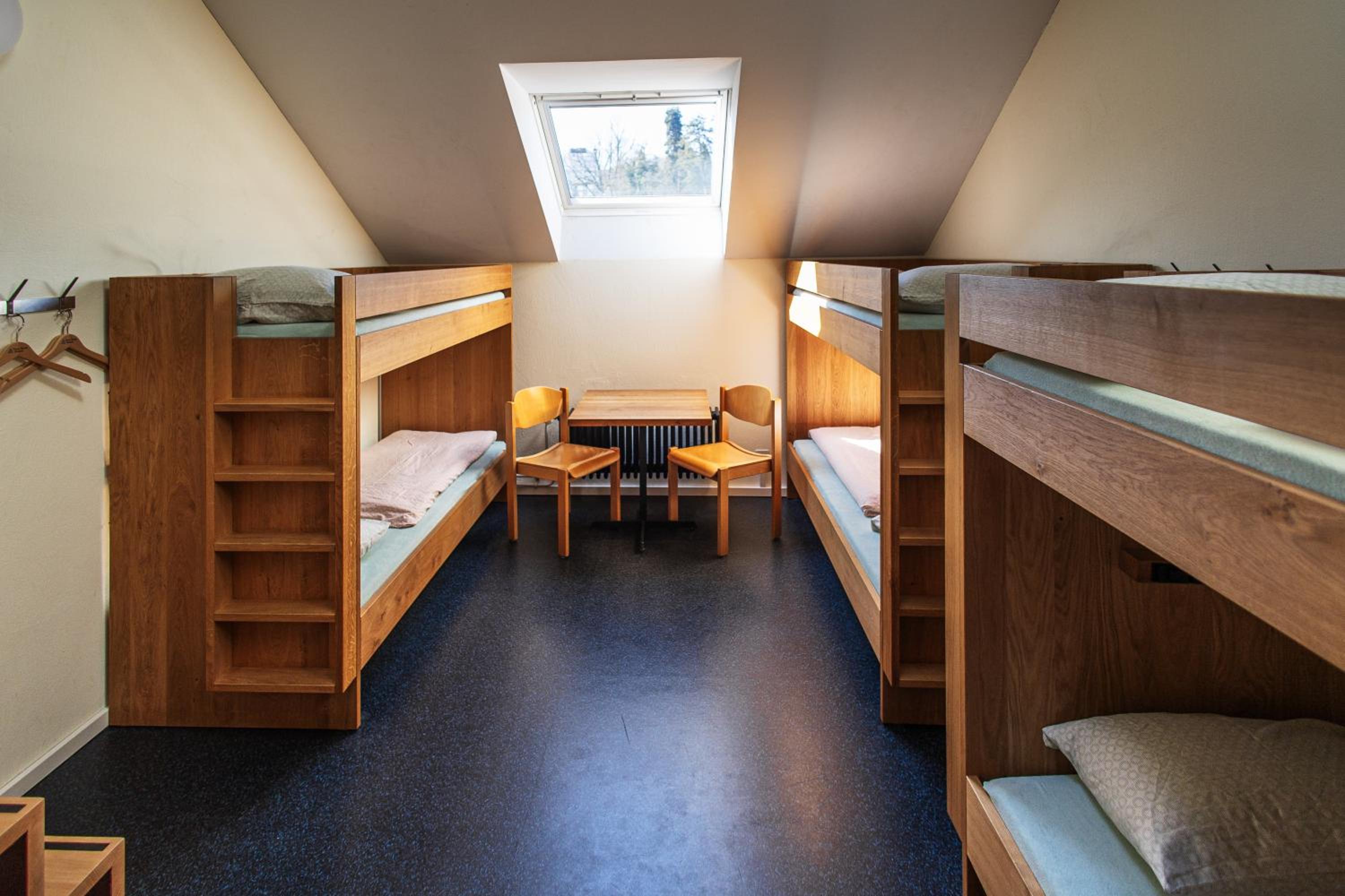 Single Bed in Dormitory Room