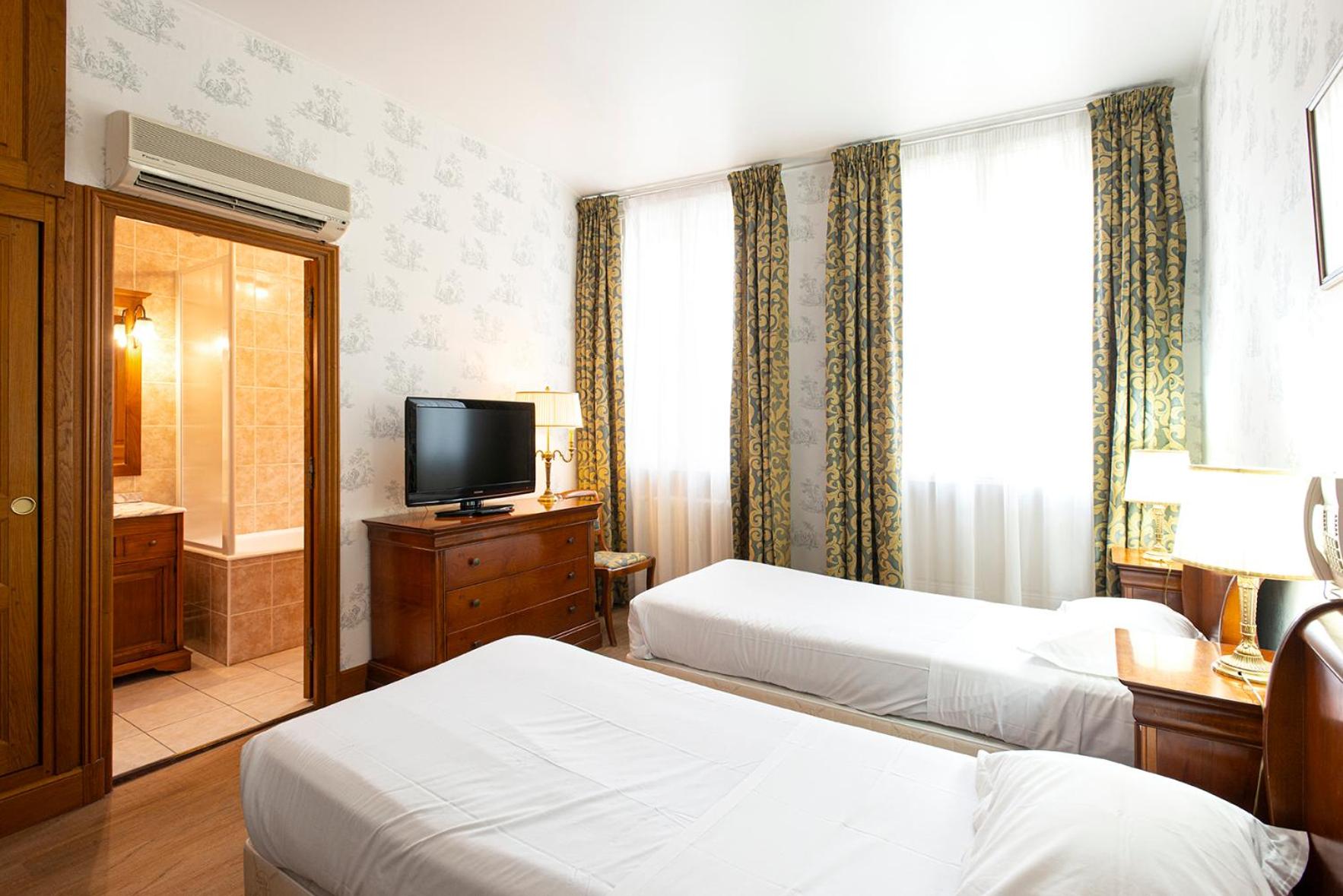 Standard Twin Room - Photo 1