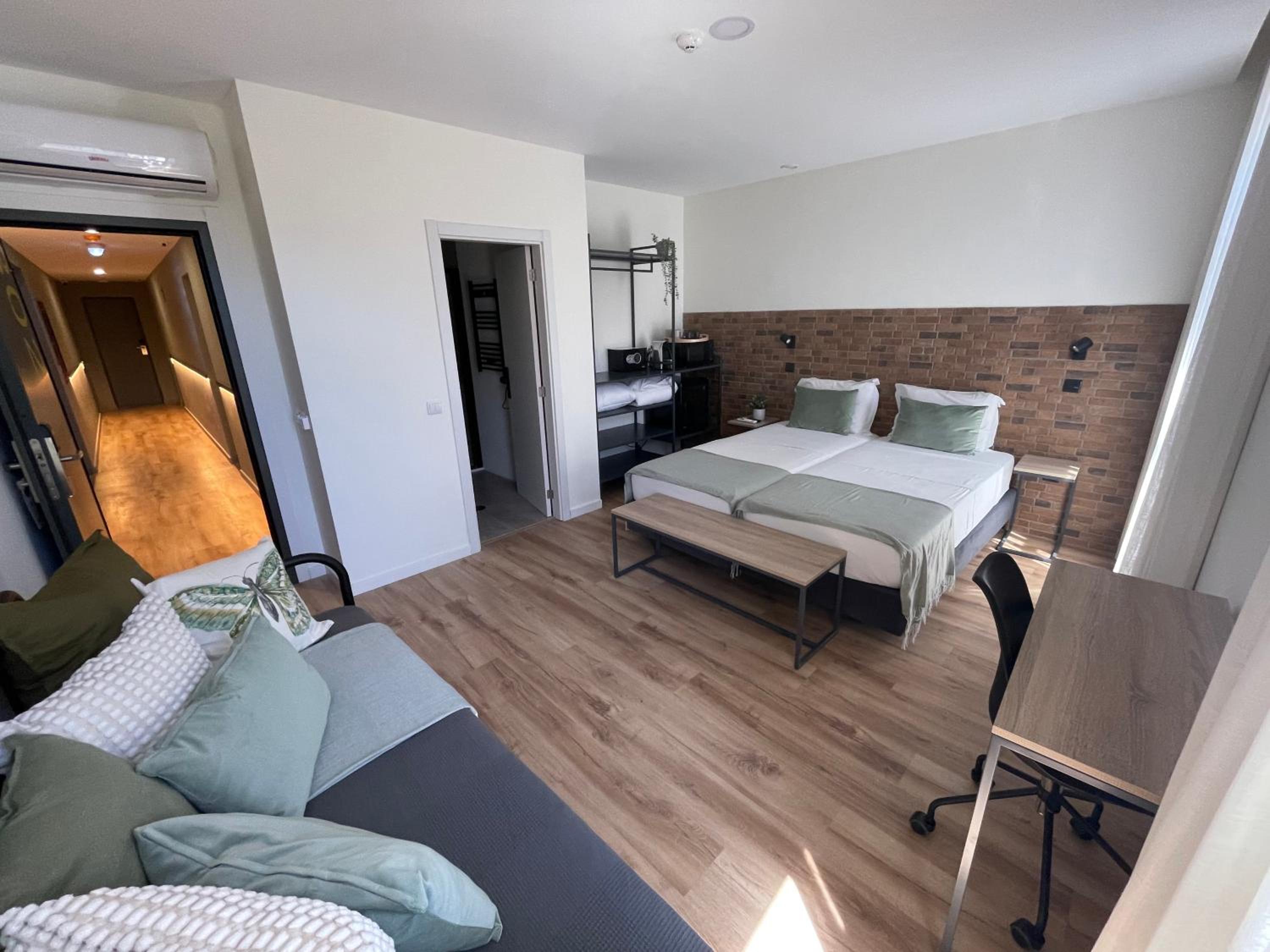 Deluxe Triple Room - Photo 1