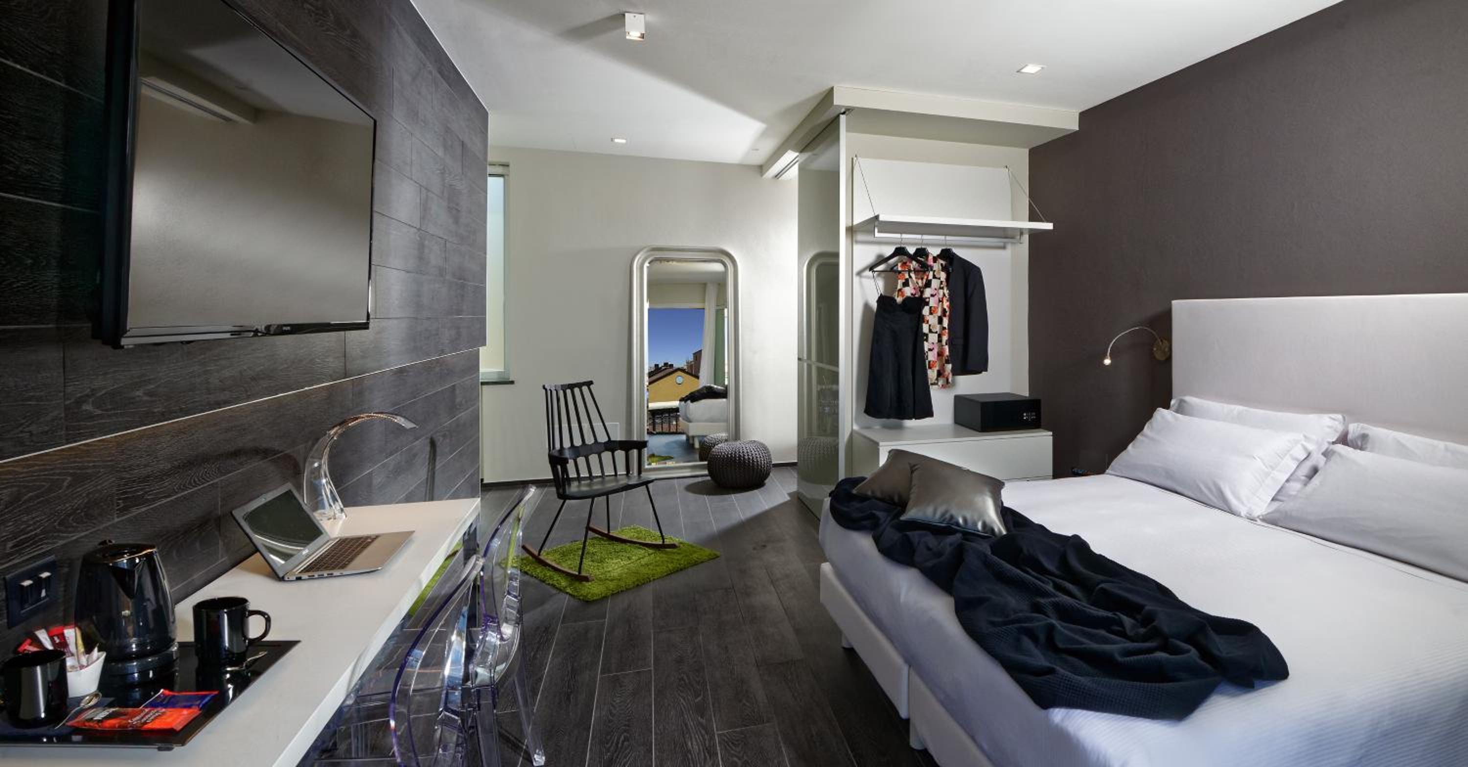 Relax in style in our modern hotel room.