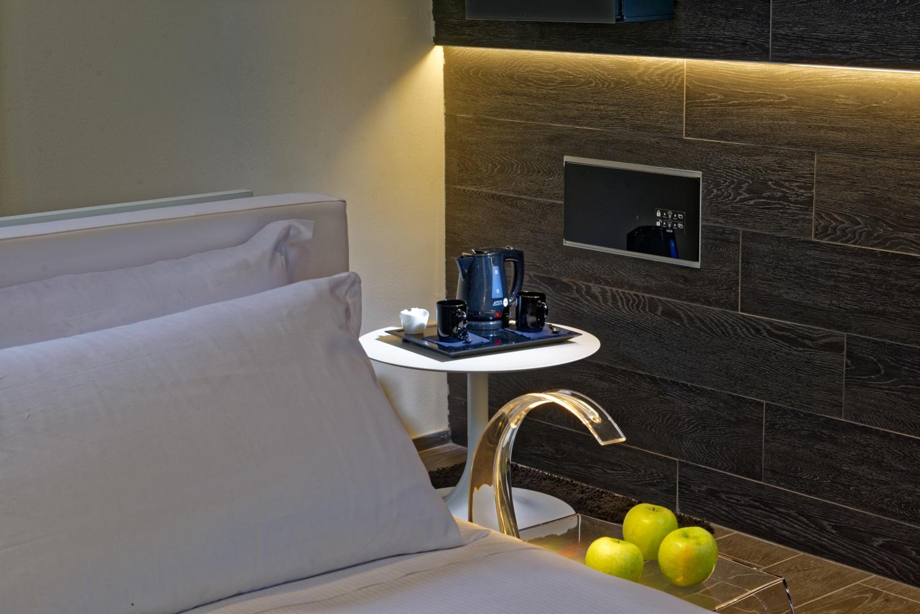 Relax in comfort with a cozy bedside setup.
