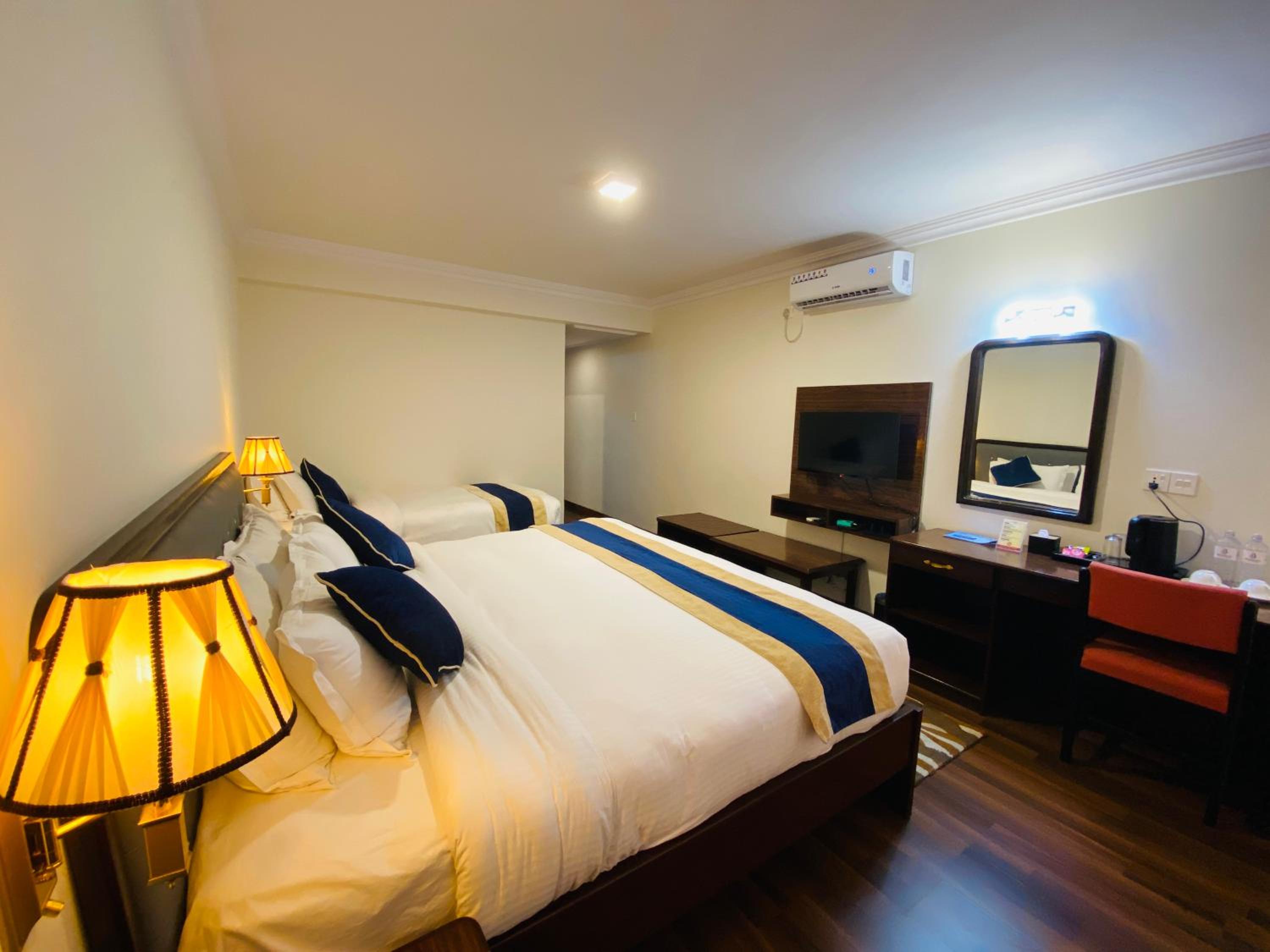 Deluxe Triple Room - Photo 8