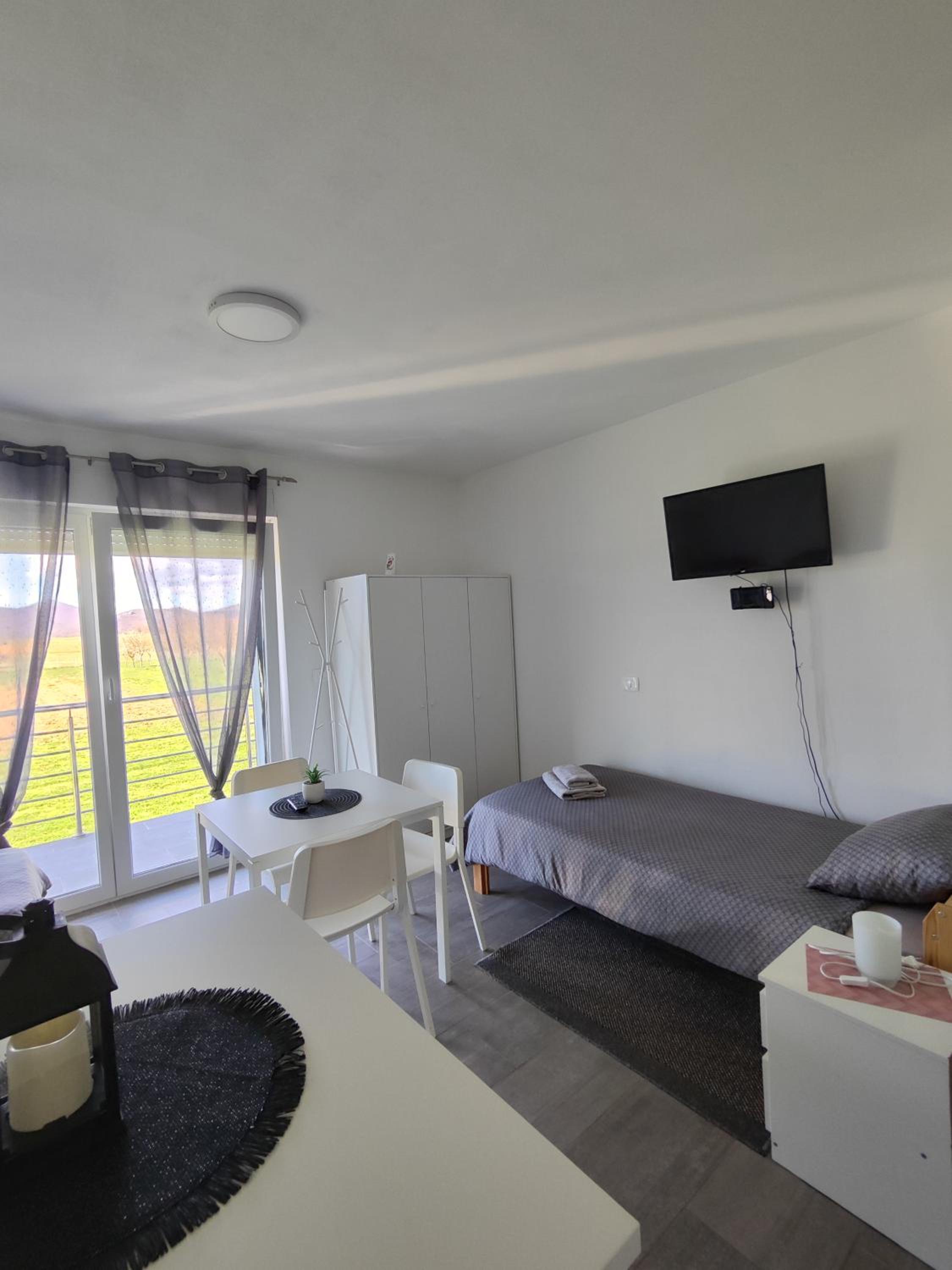 Three-Bedroom Apartment - Photo 20
