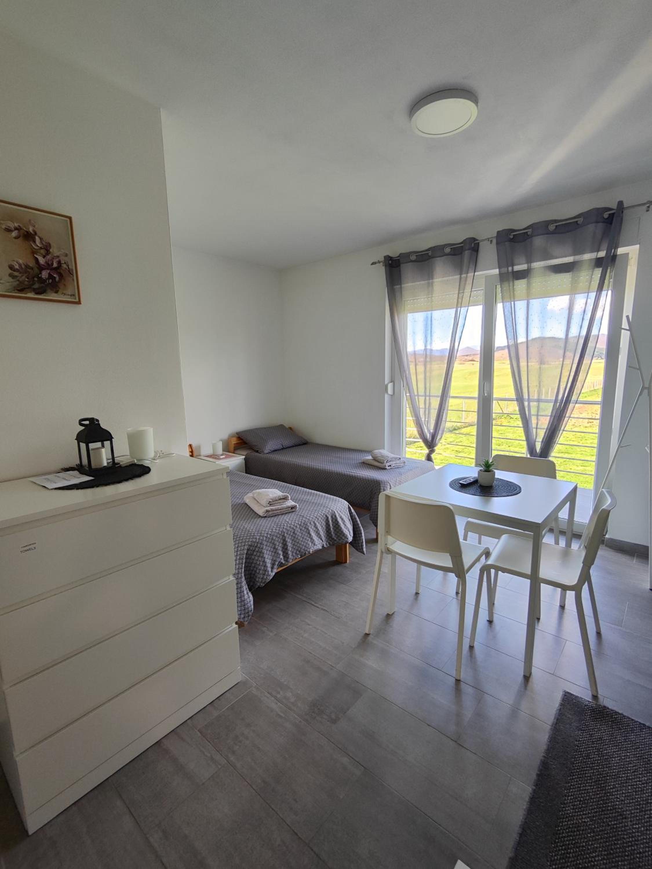 Three-Bedroom Apartment - Photo 40