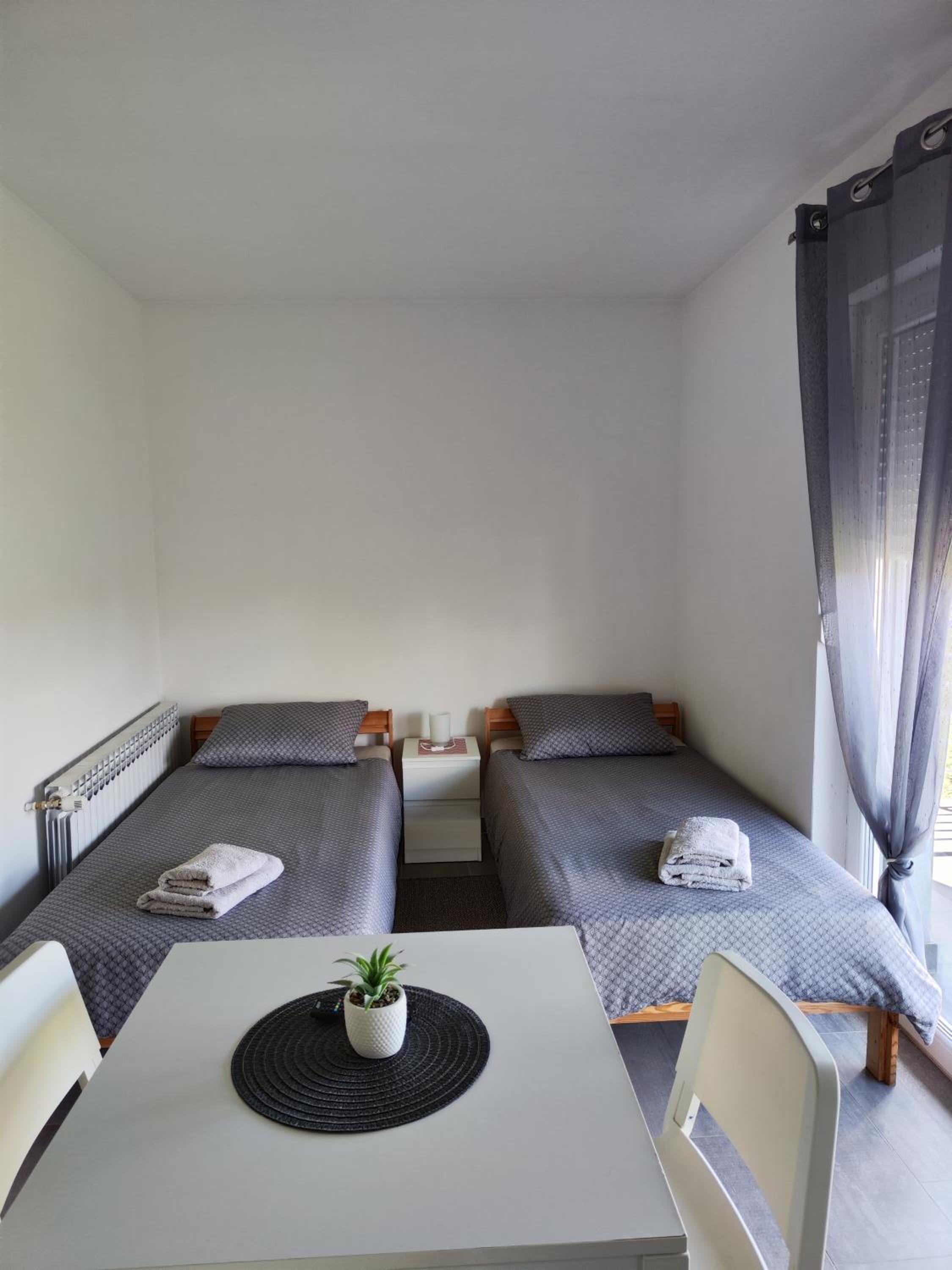Three-Bedroom Apartment - Photo 51