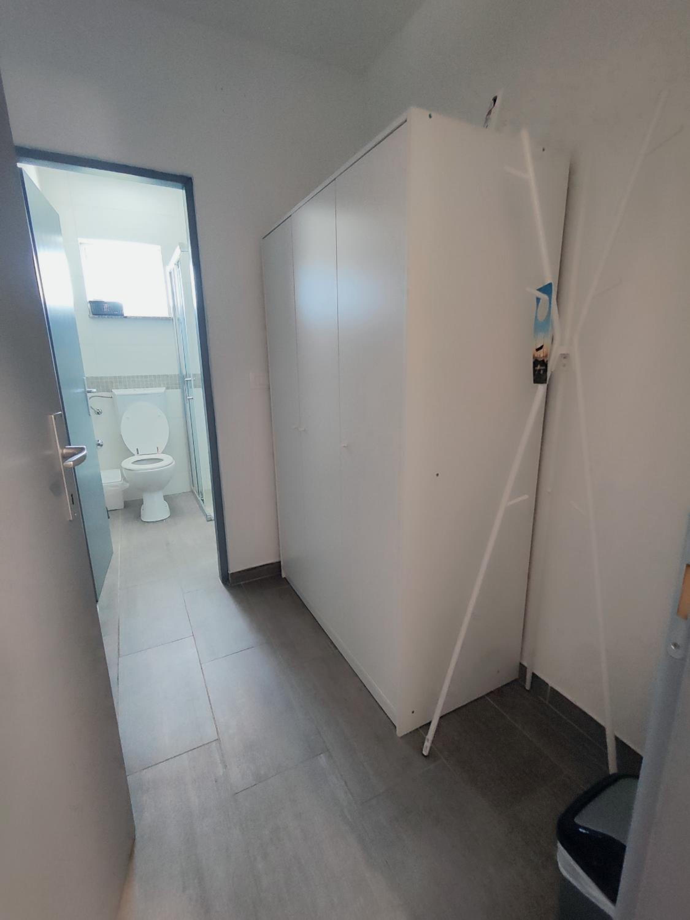 Three-Bedroom Apartment - Photo 39