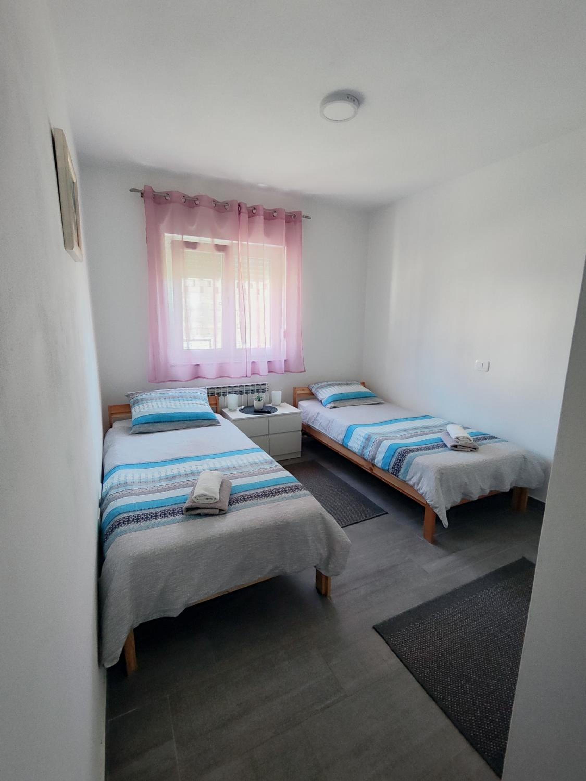 Three-Bedroom Apartment - Photo 36