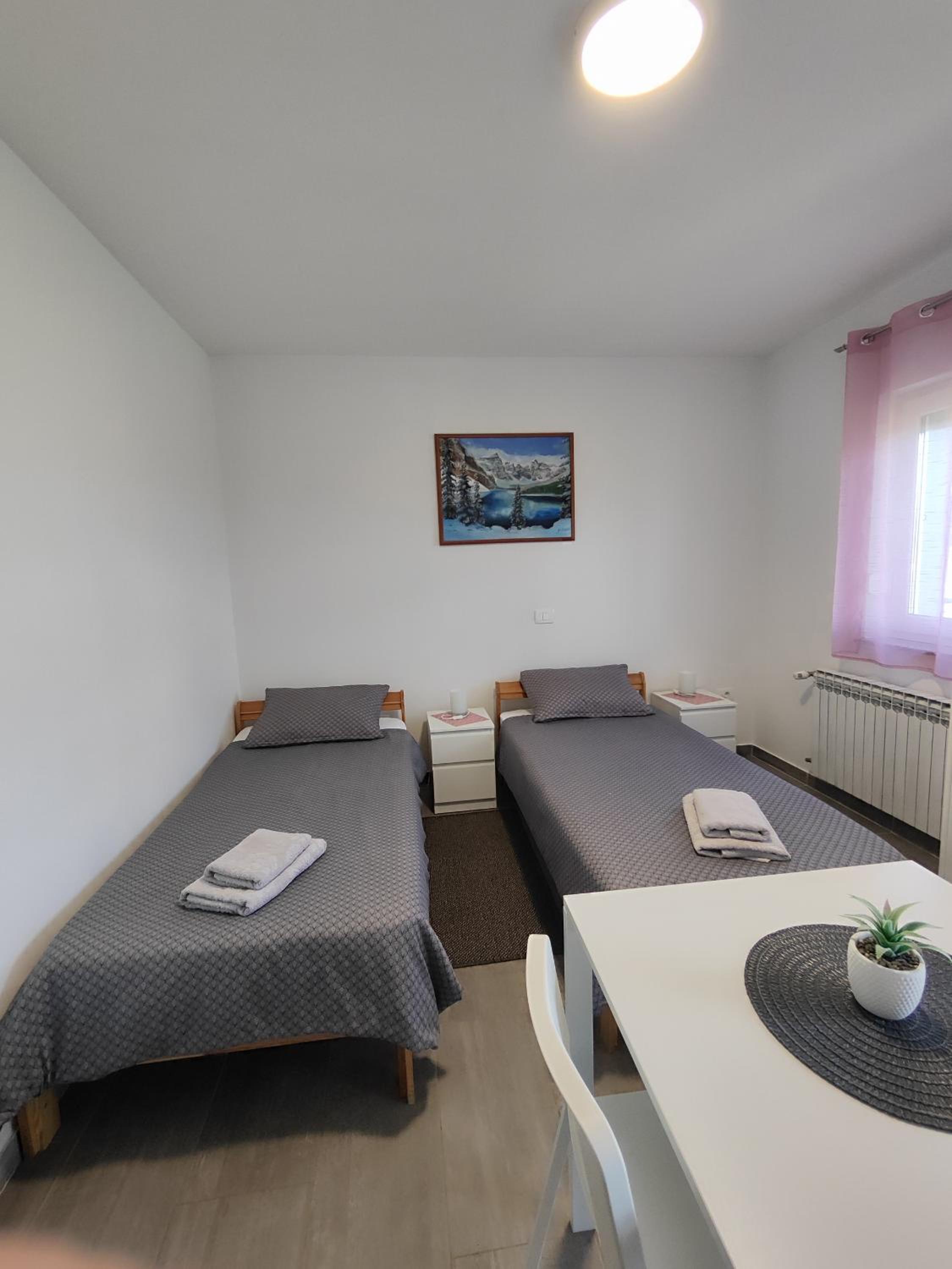 Three-Bedroom Apartment - Photo 46