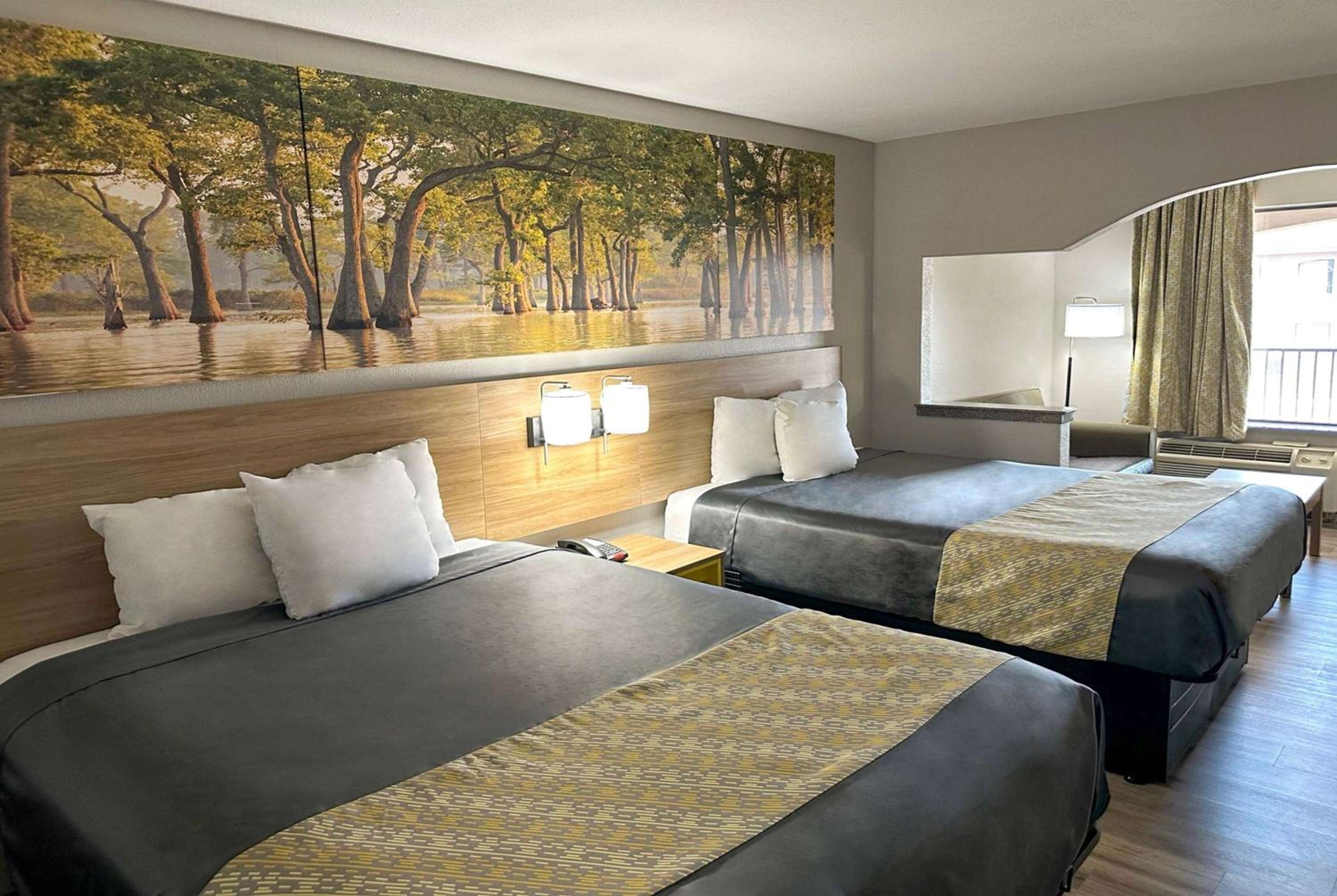Queen Room with Two Queen Beds - Smoking - Photo 1