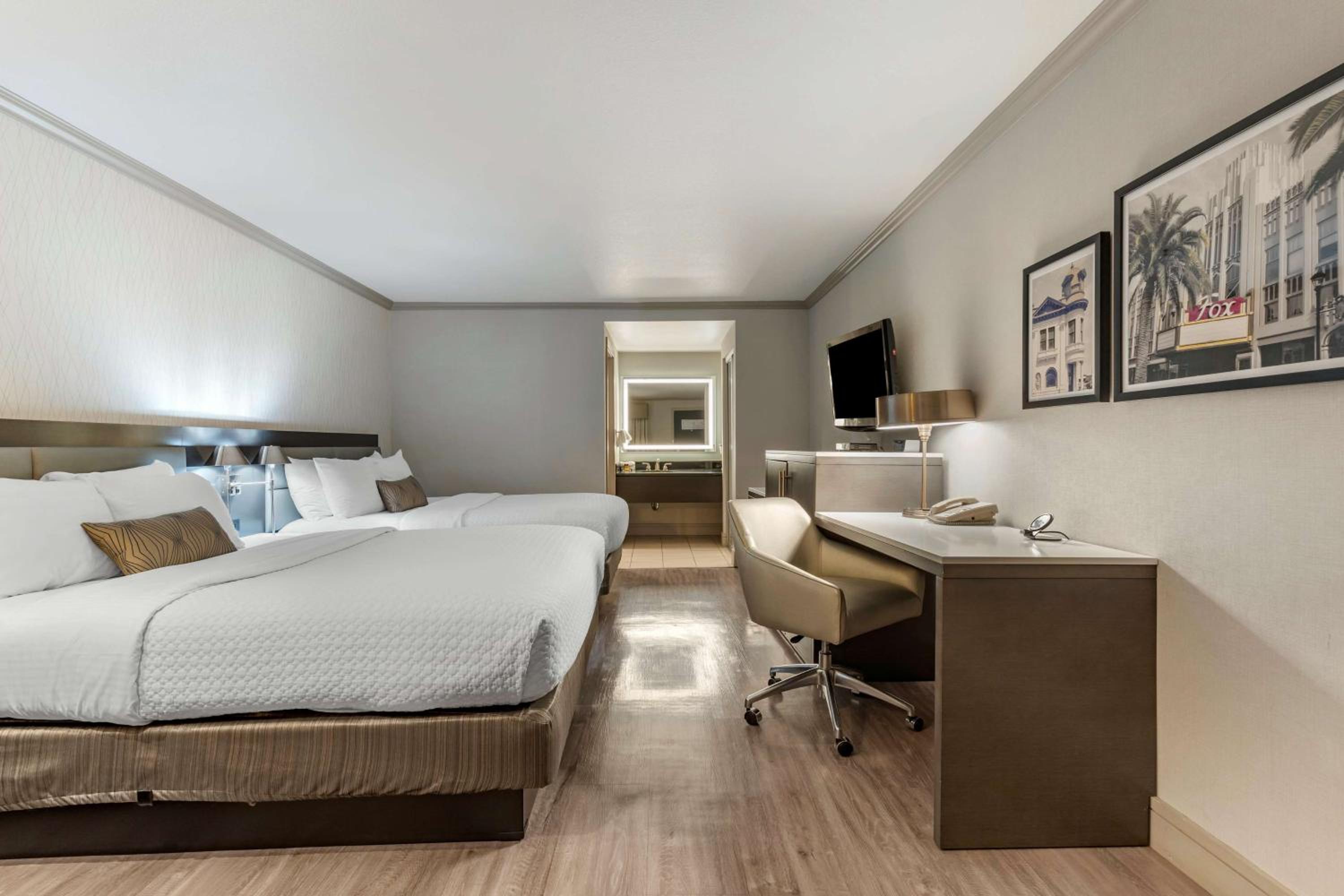 Queen Room with Two Queen Beds and Single Sofa Bed - Photo 1