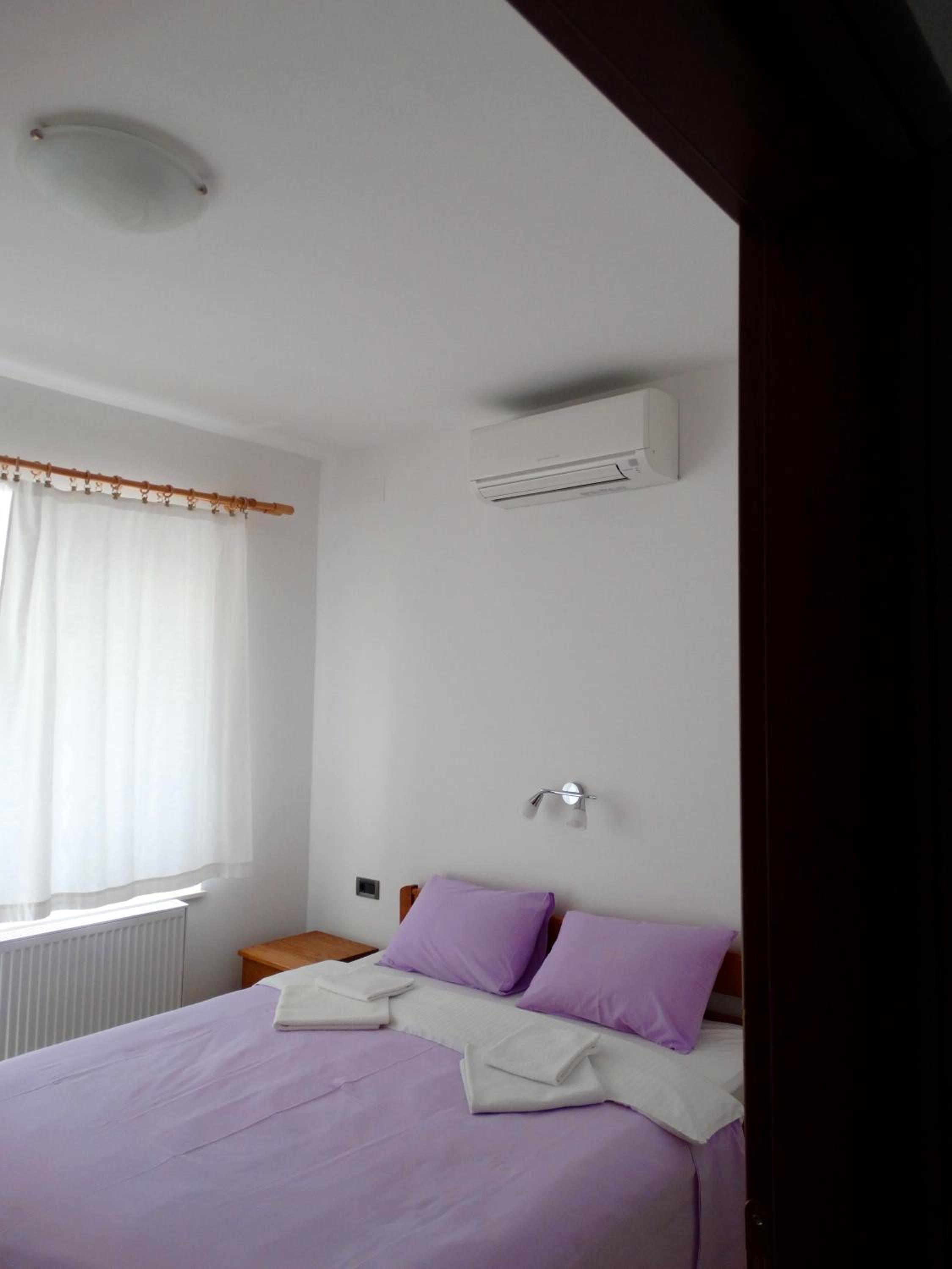 Two-Bedroom Apartment with Balcony and Sea View