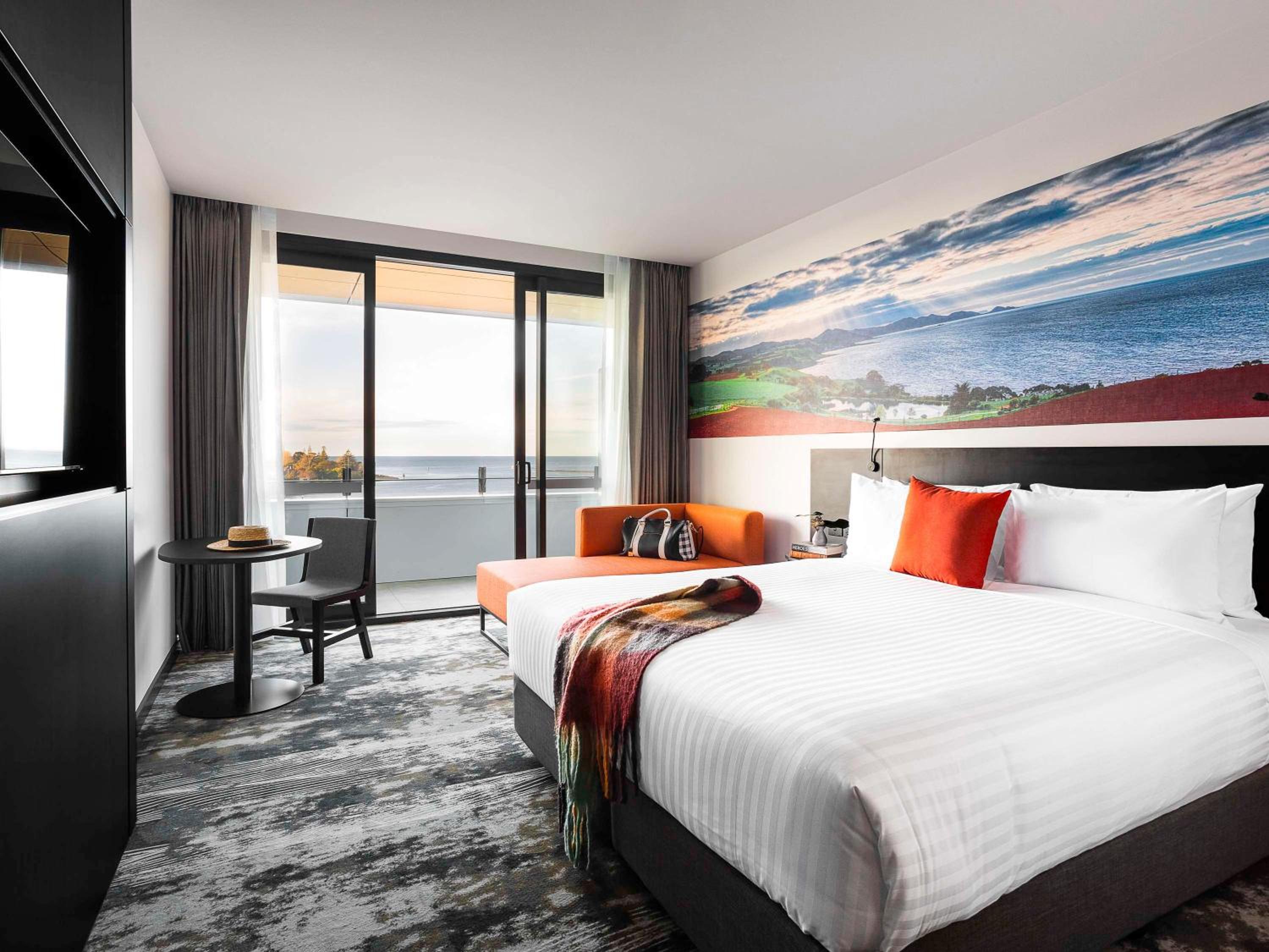 Deluxe King Room with Balcony - Photo 1