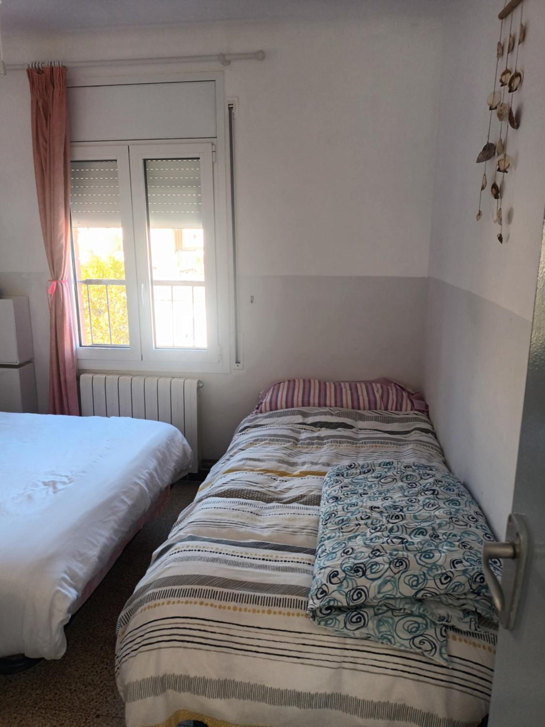 Habitación Triple Básica con Baño Compartido