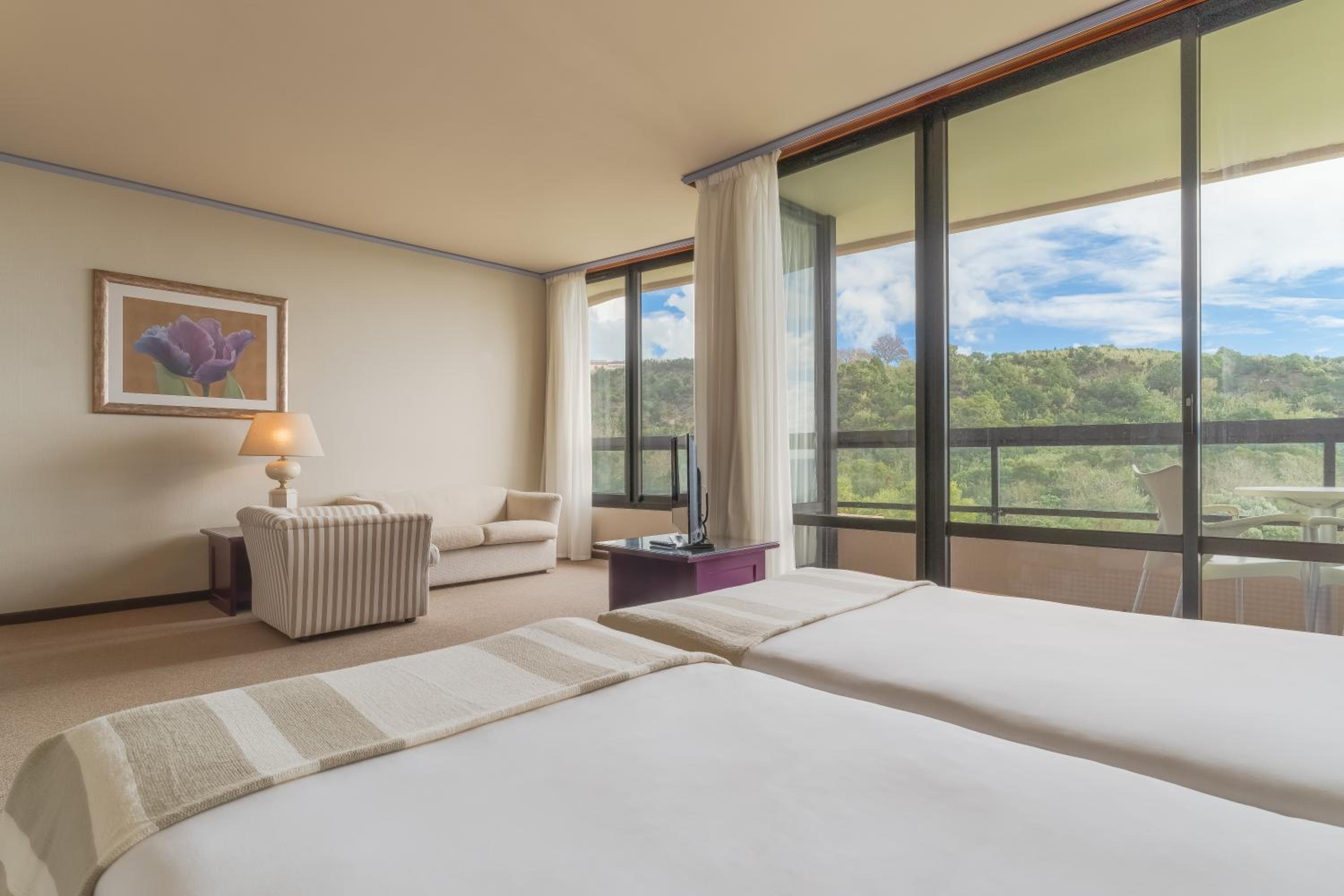 Junior Triple Suite with Garden View