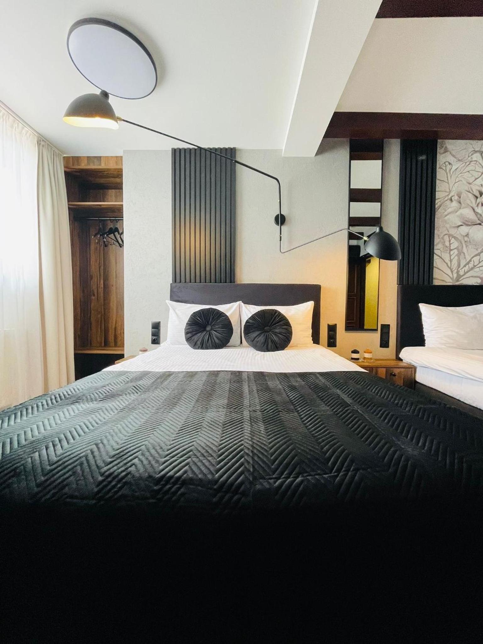 Deluxe Triple Room - Photo 11
