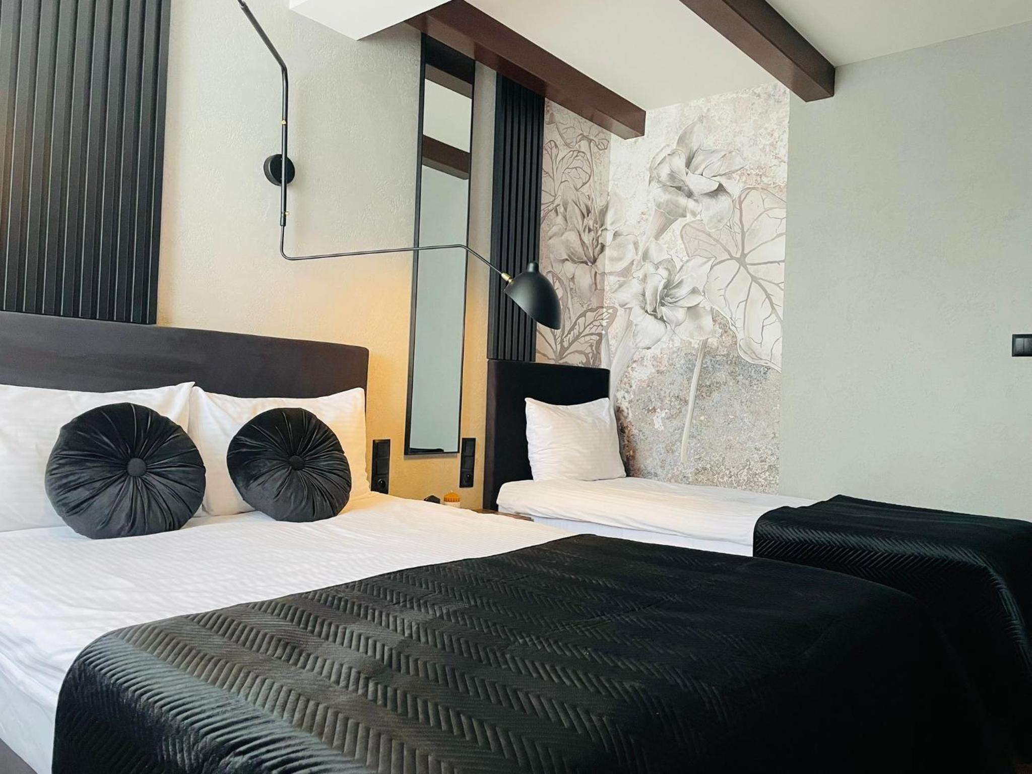 Deluxe Triple Room - Photo 16