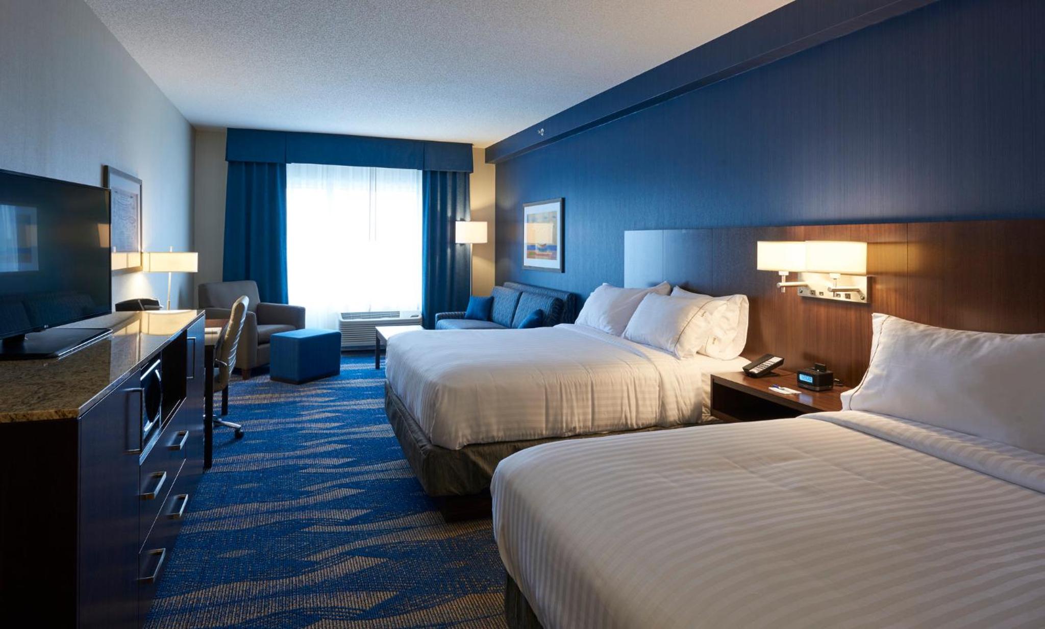 Queen Suite with Two Queen Beds and Sofa Bed