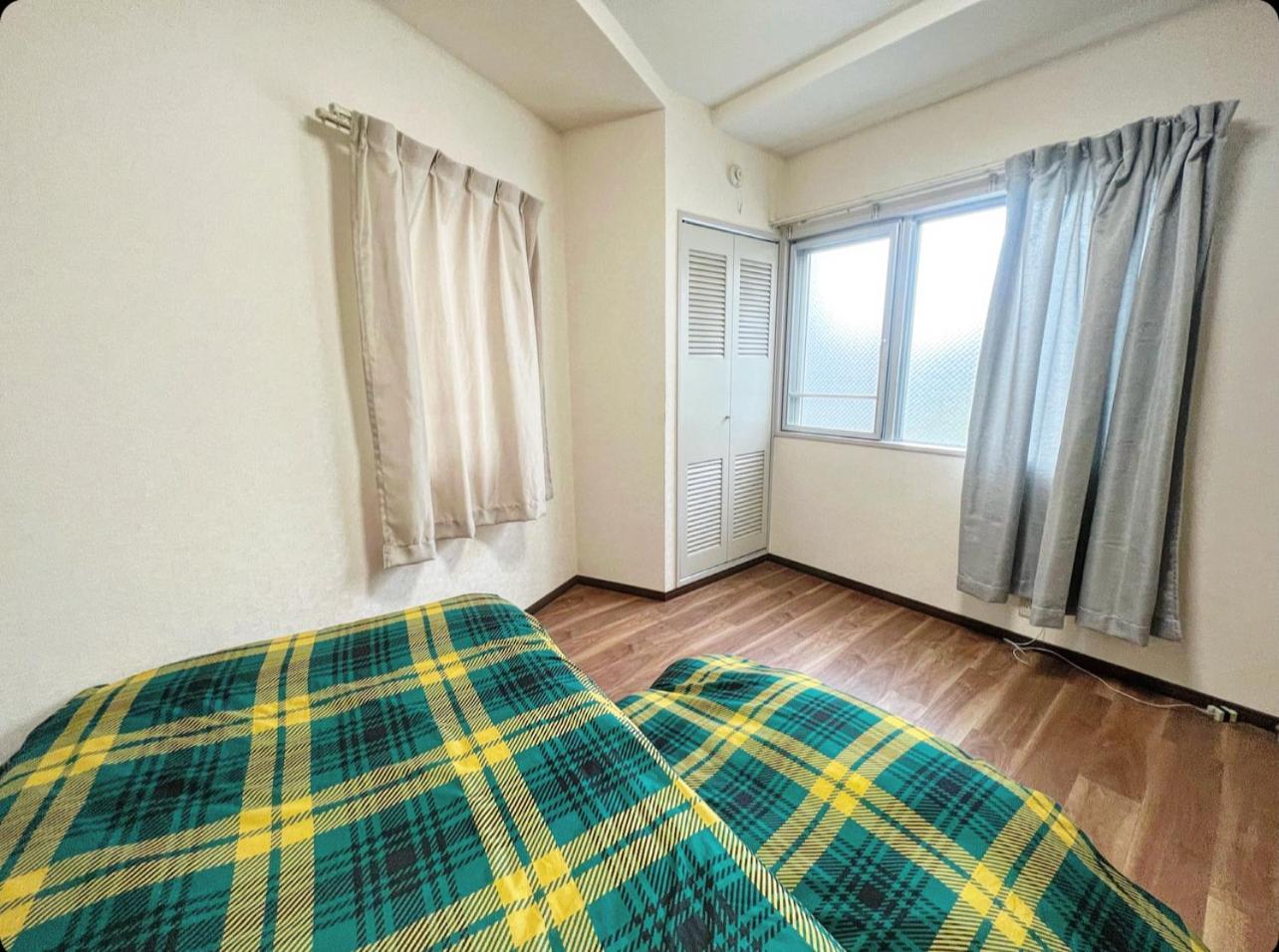 Economy Triple Room With Shared Bathroom photo 3